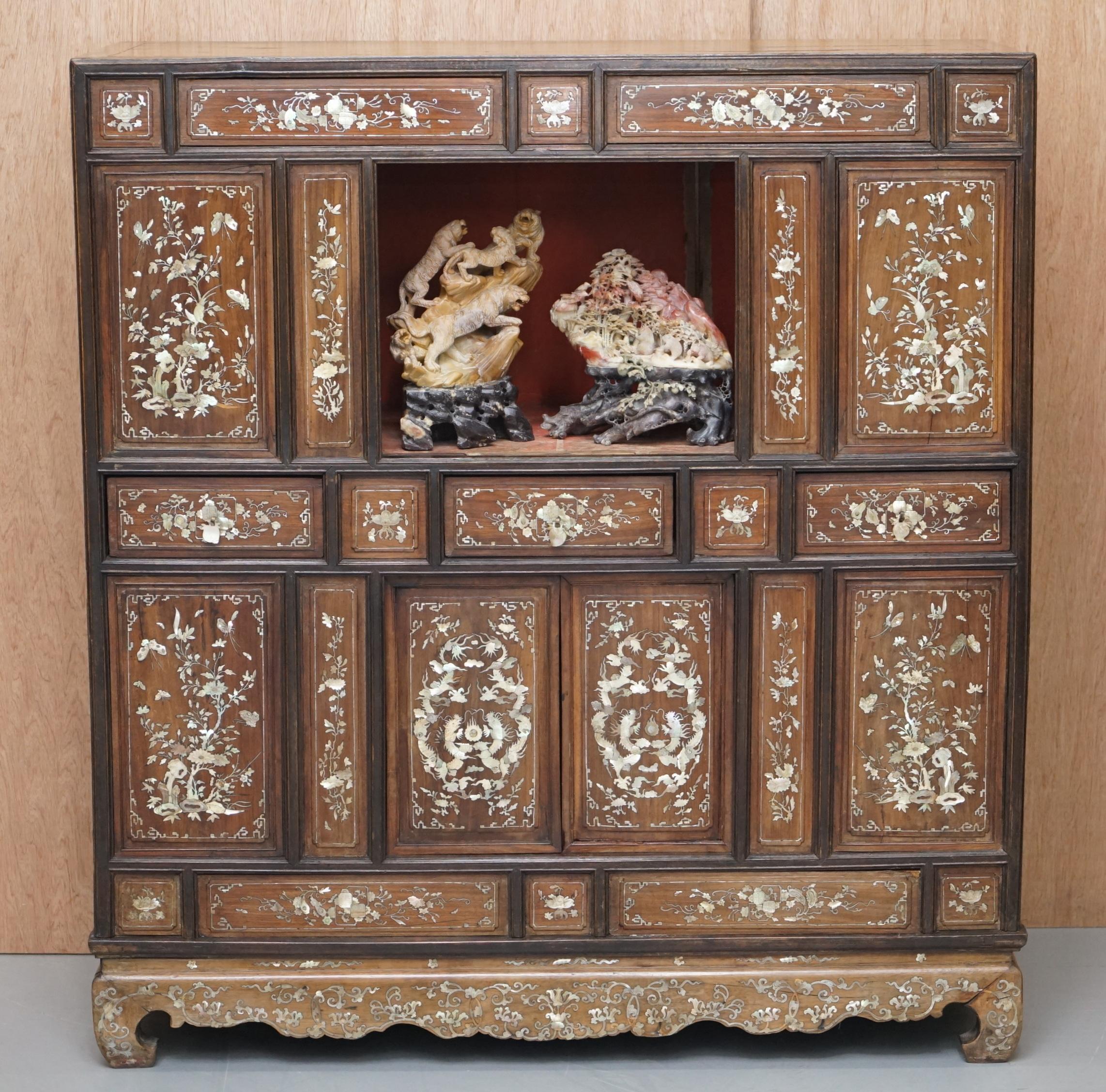 We are delighted to offer for sale this stunning exceptionally rare original circa 1820 Chinese Mother of Pearl inlaid cabinet 

A very rare and collectable piece, it has two cupboards three drawers and a nice platform on top for displaying