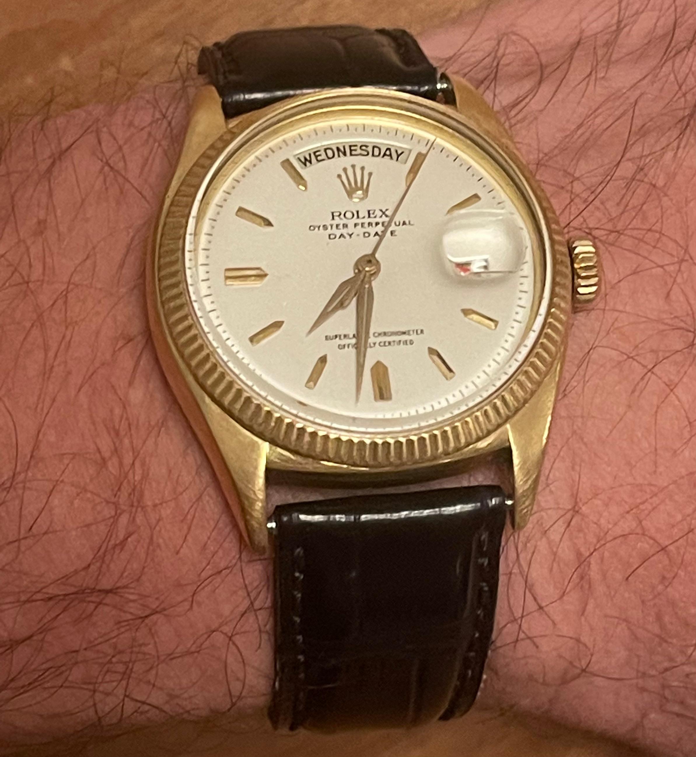 Very rare and early Rolex President with red Date 1