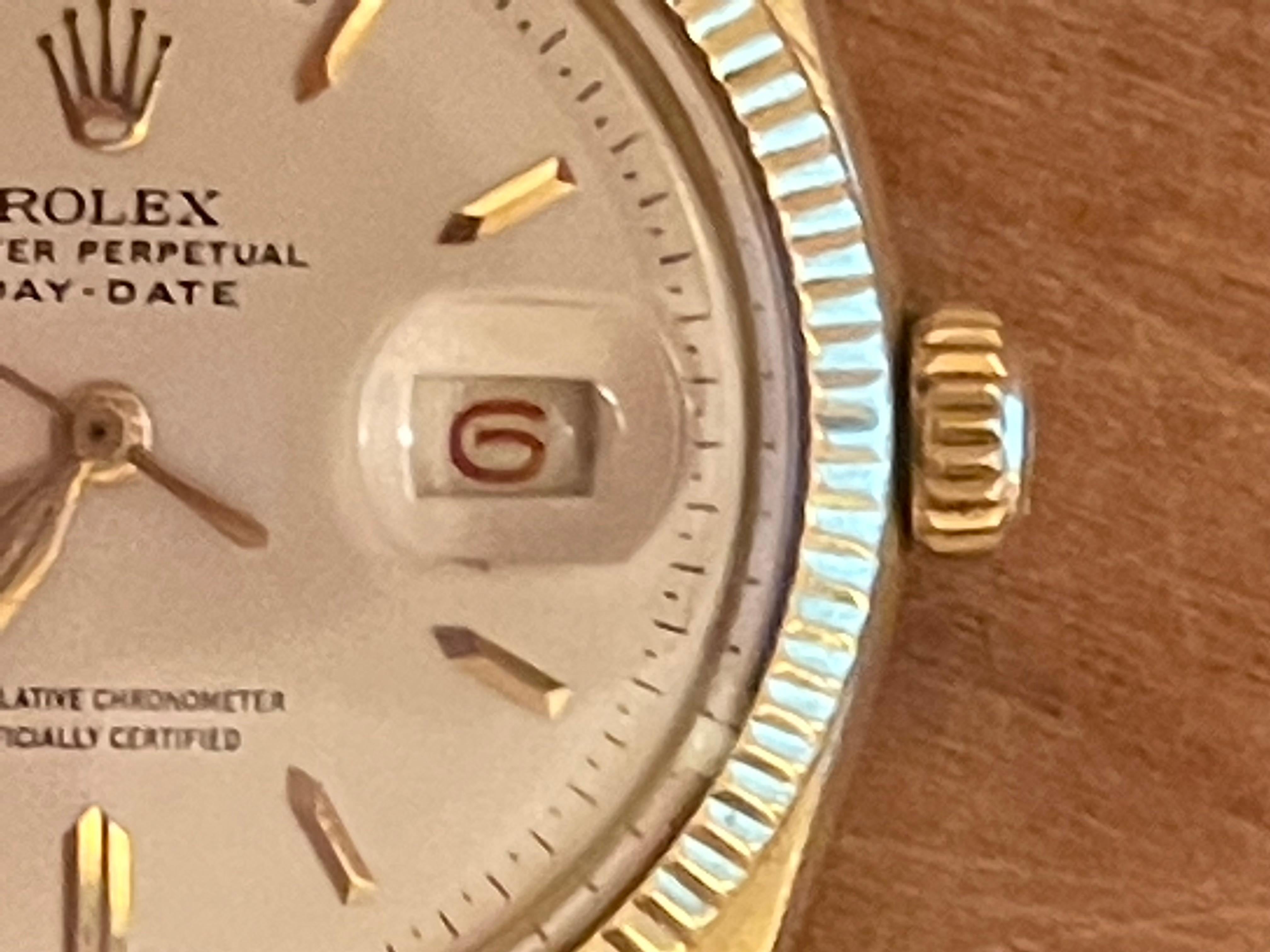 Very rare and early Rolex President with red Date 2
