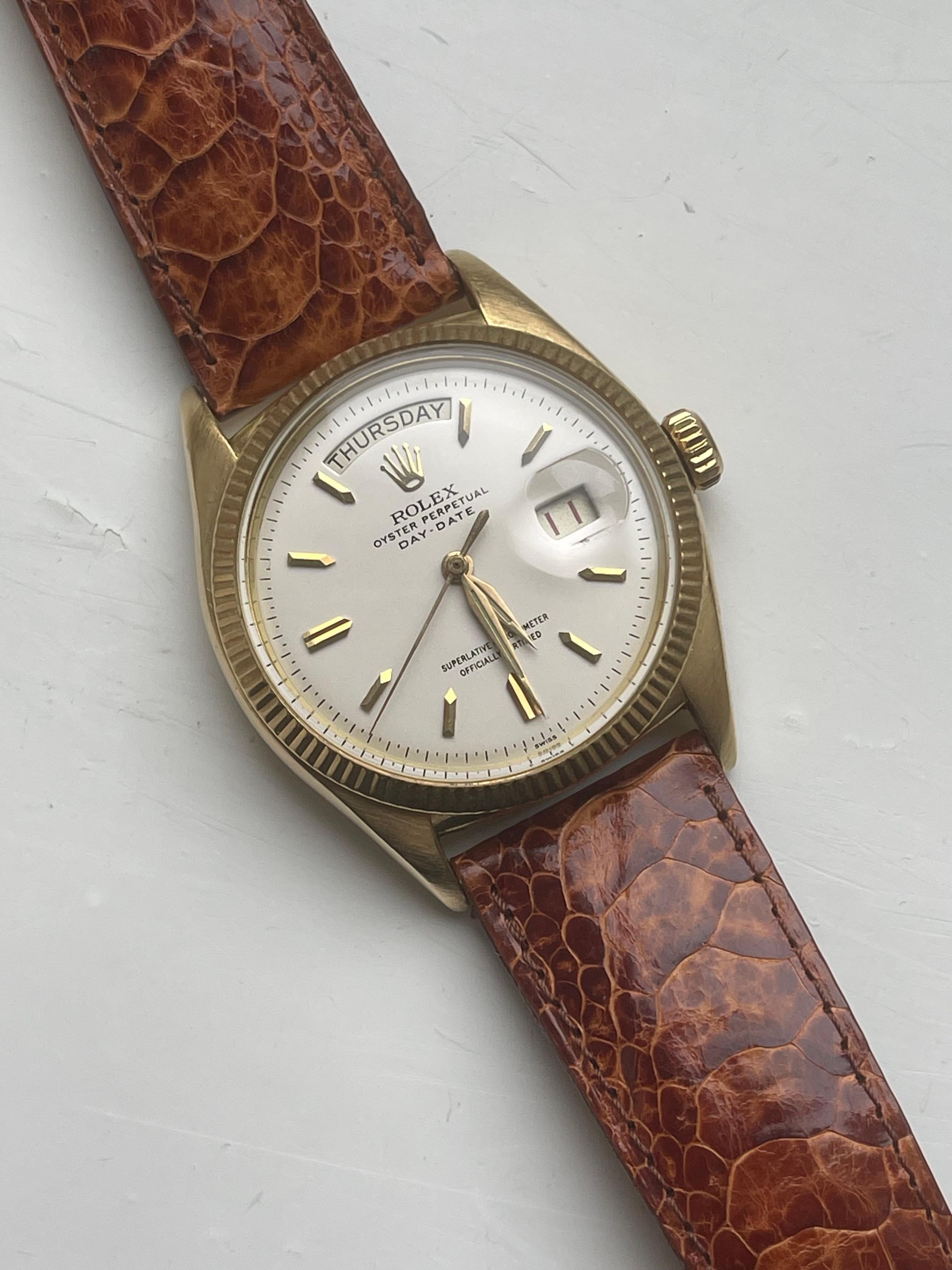Very rare and early Rolex President with red Date 9