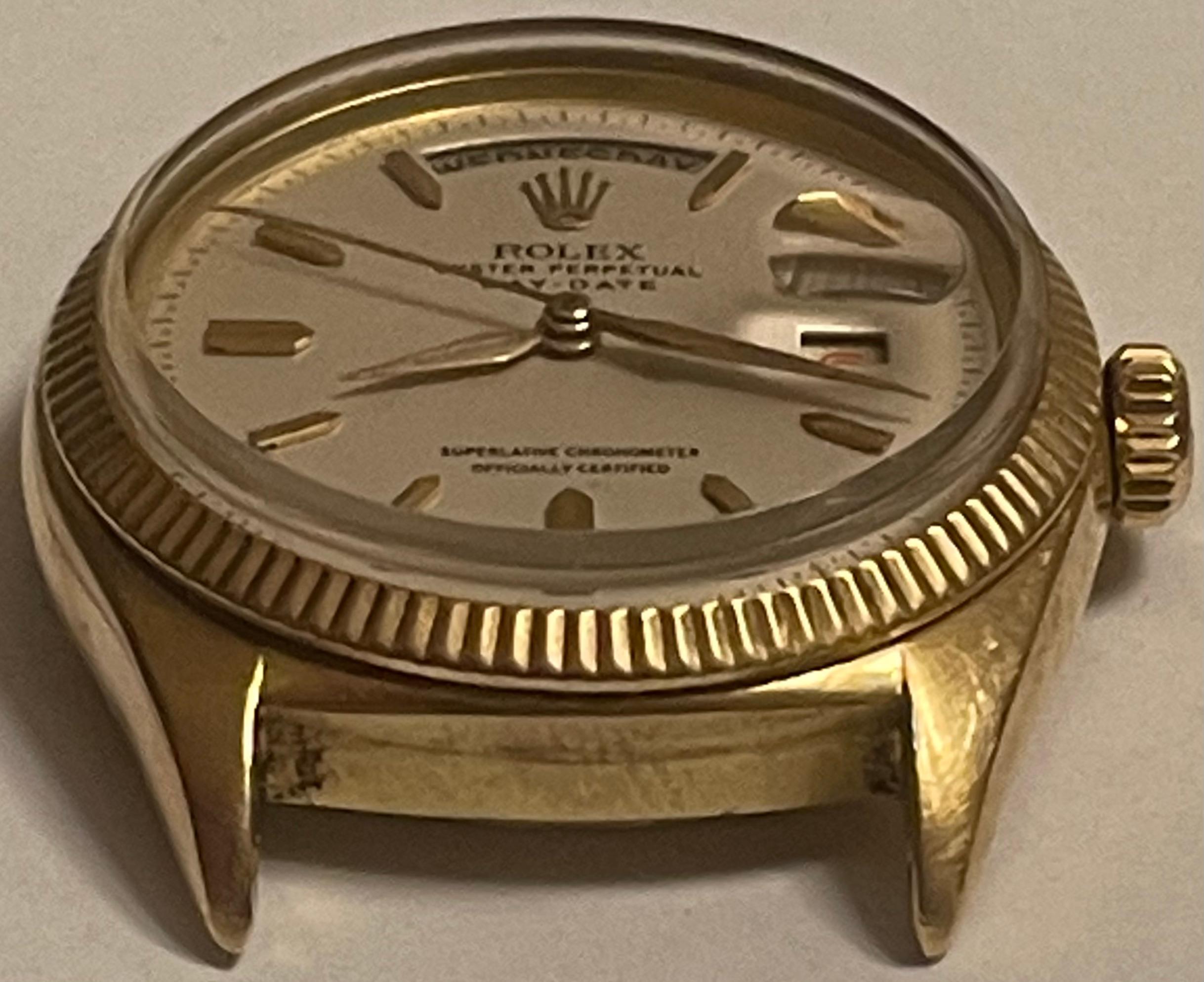 Very rare and early Rolex President with red Date 3