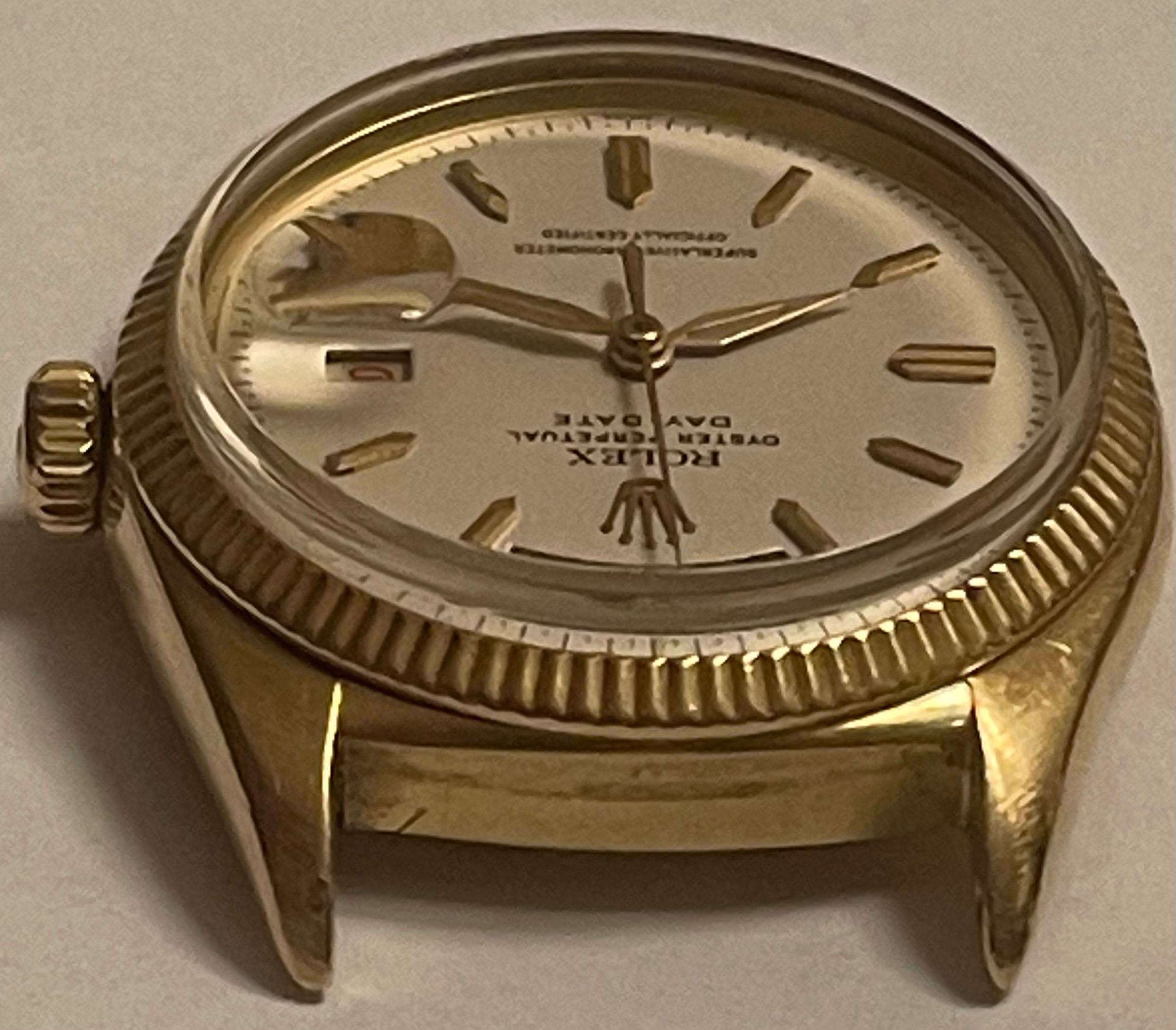 Very rare and early Rolex President with red Date 4