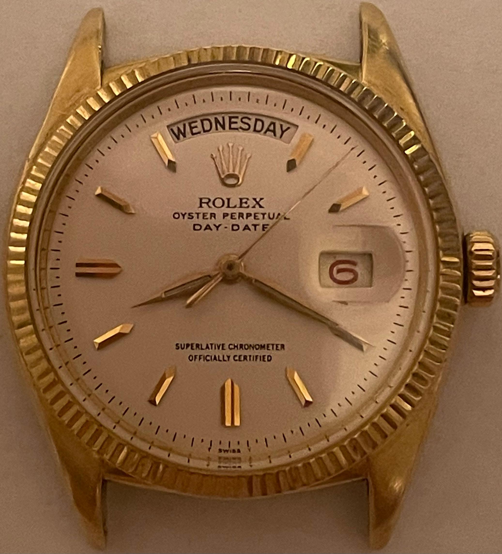 Very rare and early Rolex President with red Date 5