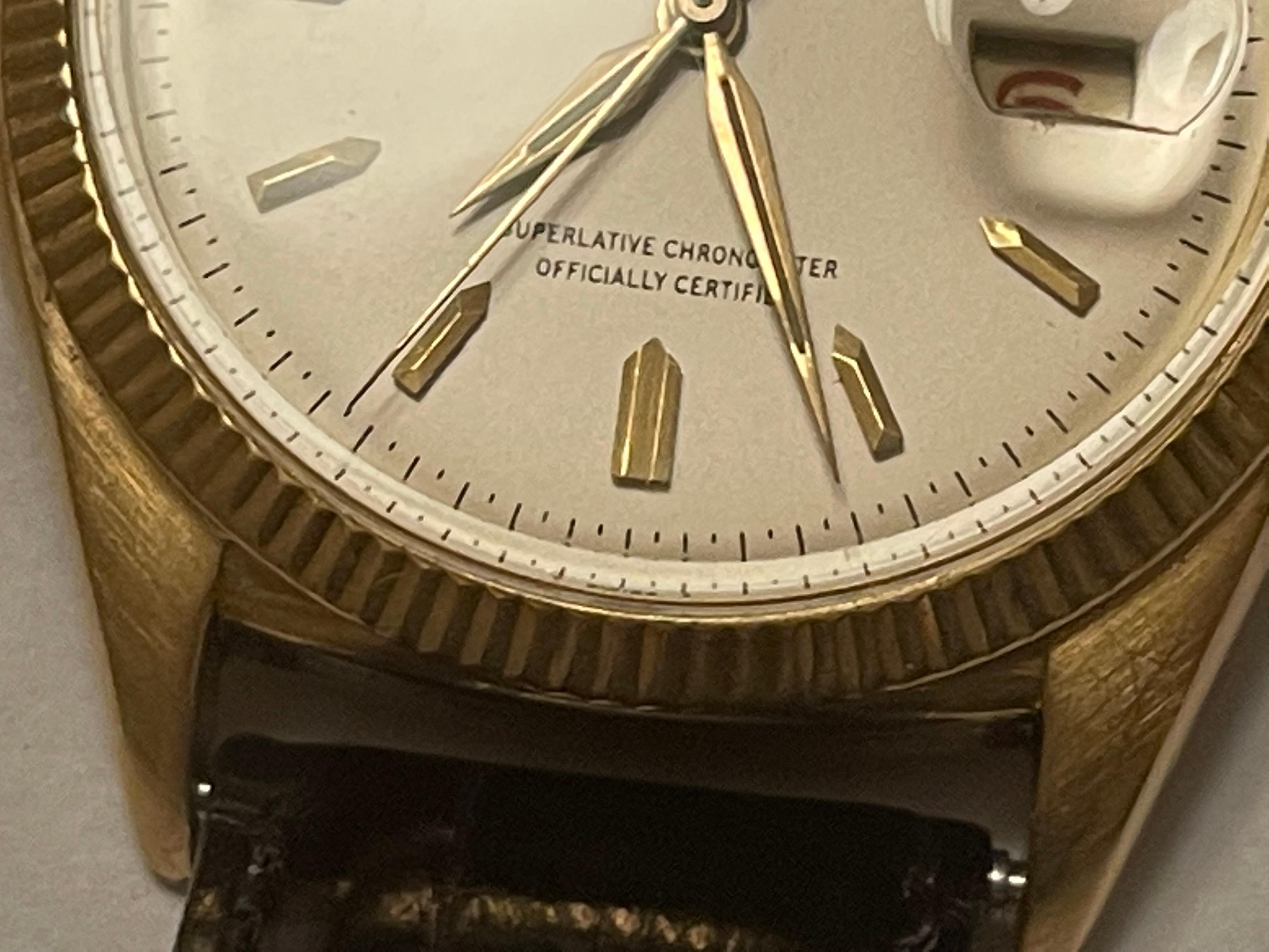 Swiss Very rare and early Rolex President with red Date