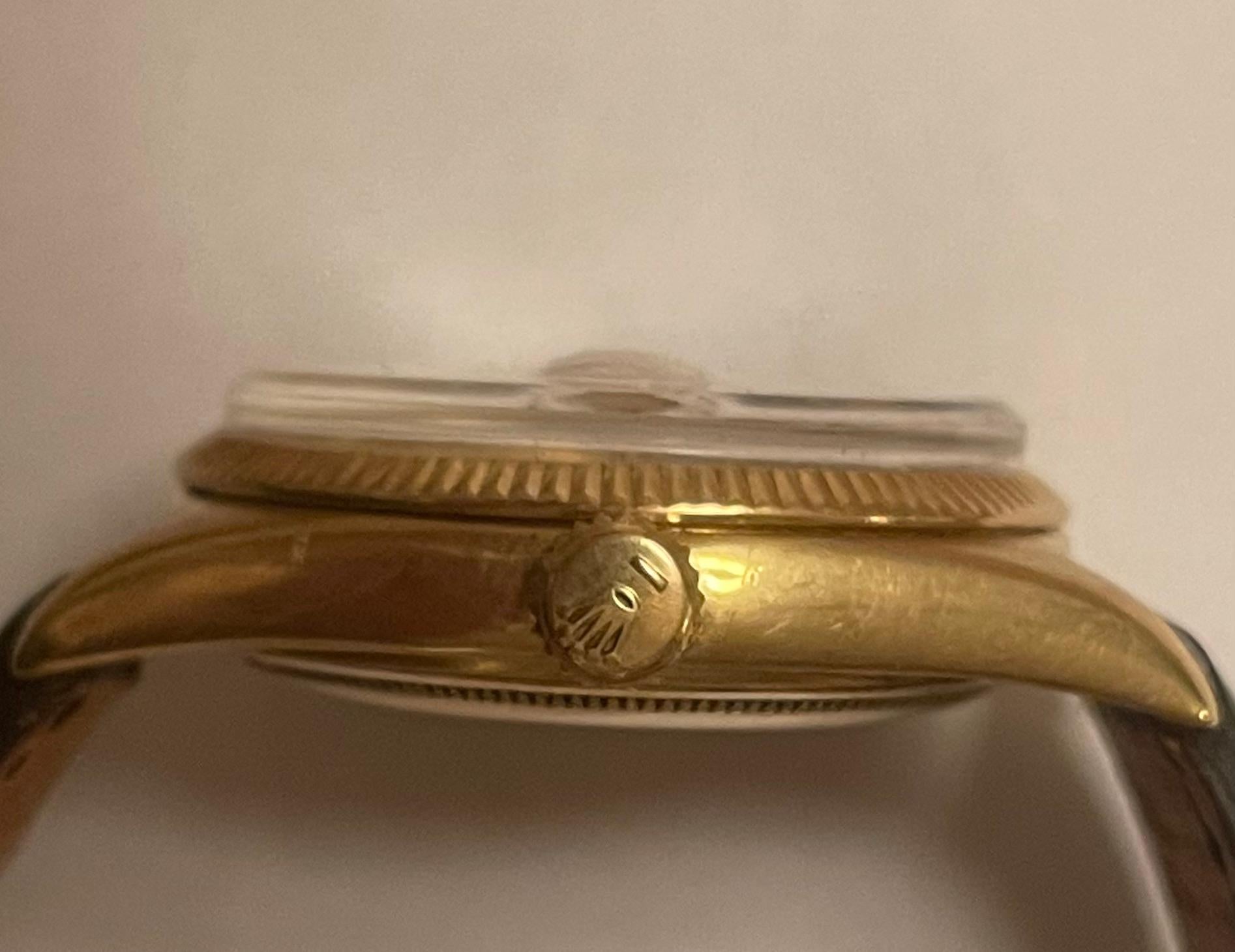 Gold Very rare and early Rolex President with red Date