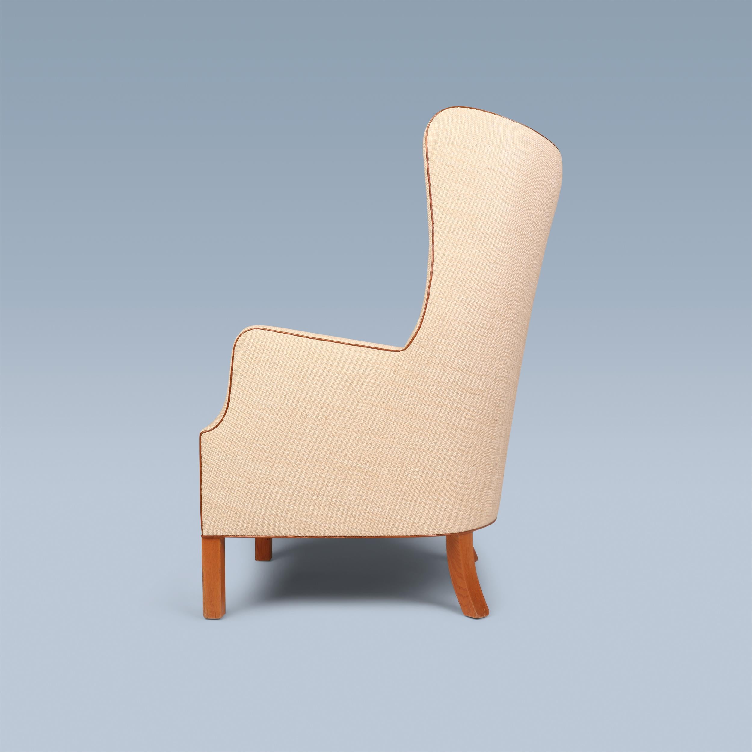 This very rare and early wingback was designed in 1946 by Grete Jalk (1920-2006) and Ejner Larsen (1917-1987). The legs are of elm. Seat, back and sides are upholstered with light fabric including Niger leather buttons and piping.
The young Grete