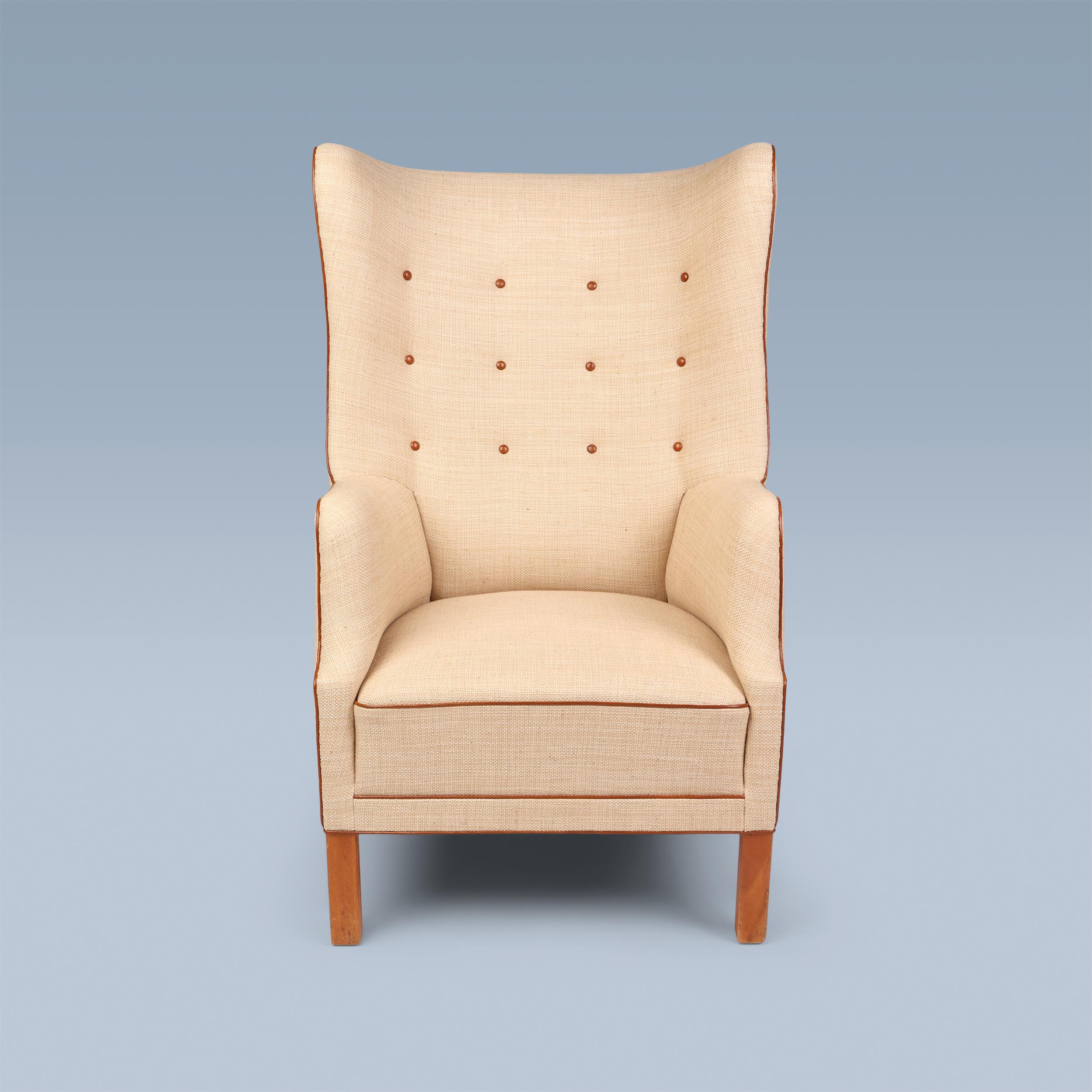 Scandinavian Modern Danish wingback armchair with off-white canvas, Niger leather details, elm legs For Sale