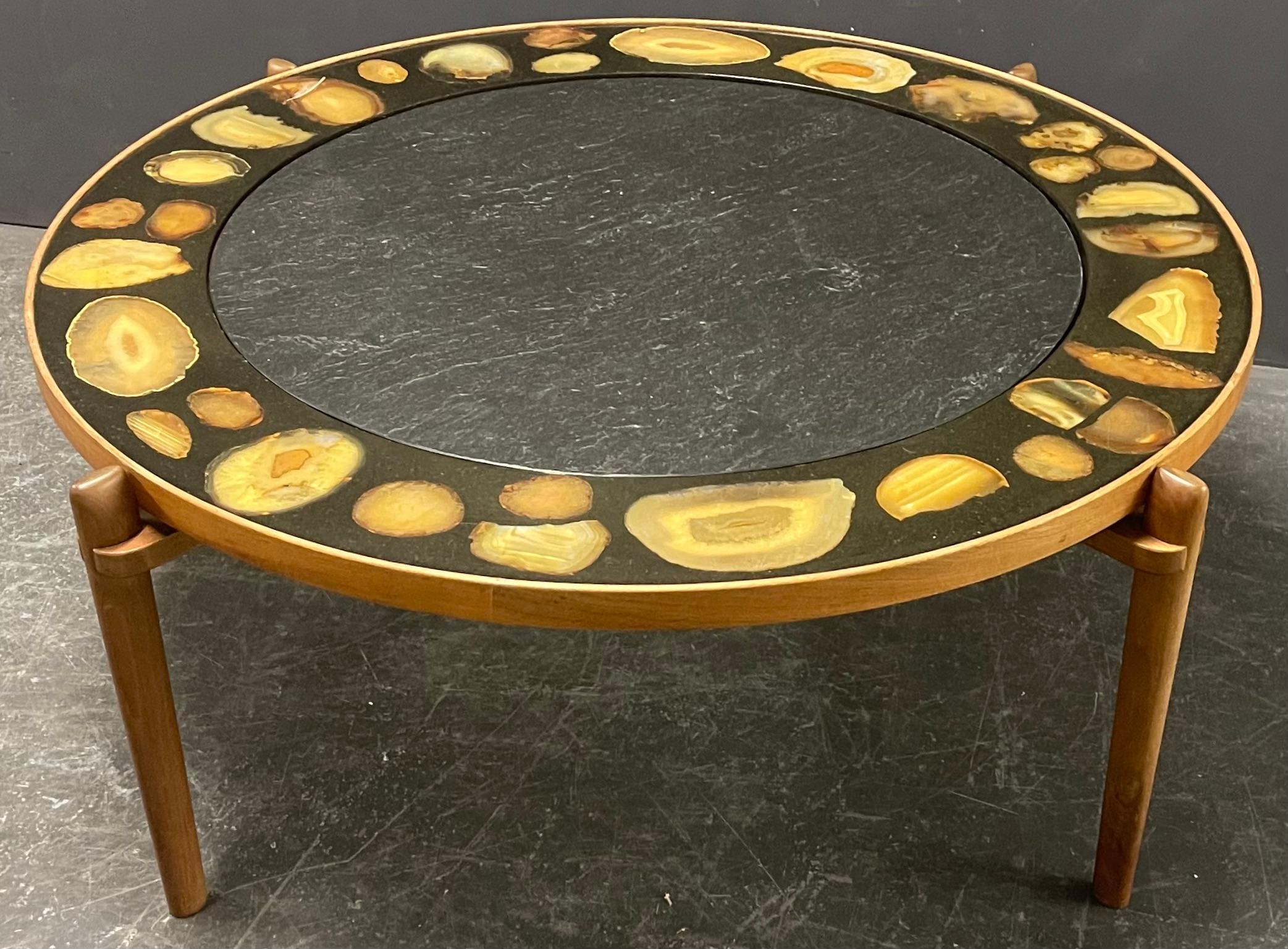 Very elegant massive teakwood base with a slate top surrounded by a belt of large agate inlays. made by the famous glass artist Heinz Lilienthal, who worked for Aristoteles Onassis und Stavros Niarchos.