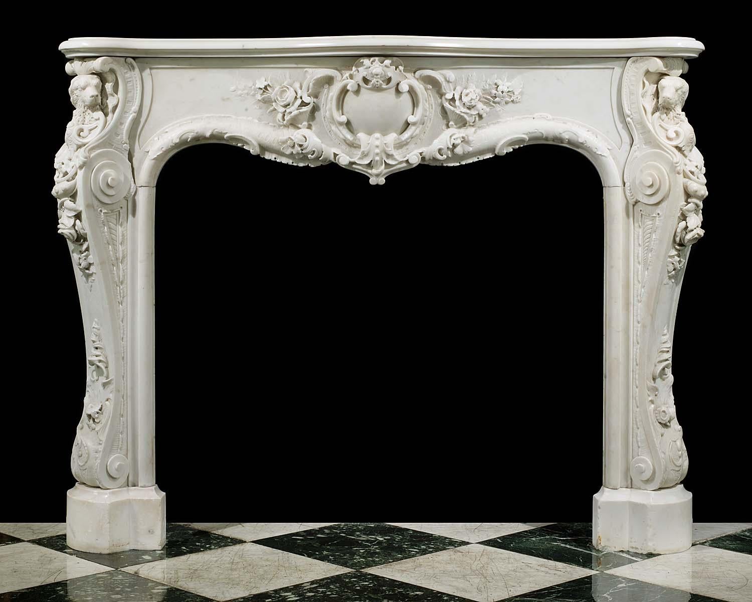 Irish water spaniels
A rare and remarkable English Rococo Statuary Marble antique chimneypiece with richly and intricately carved floral and rocaille decoration. The boldly conceived and executed central cartouche bordered by both subtle and high