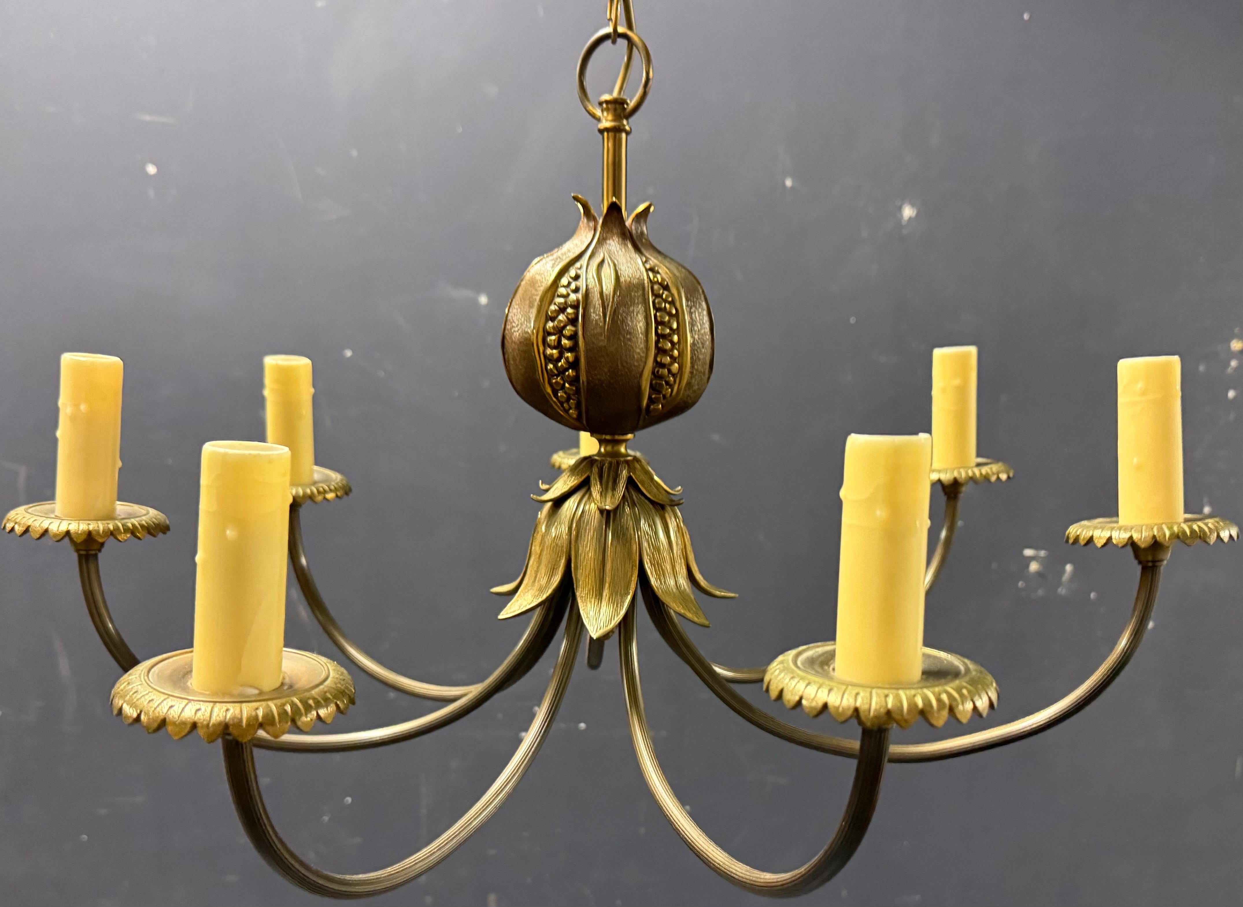 Rare, signed and out of production chandelier by Maison Charles.