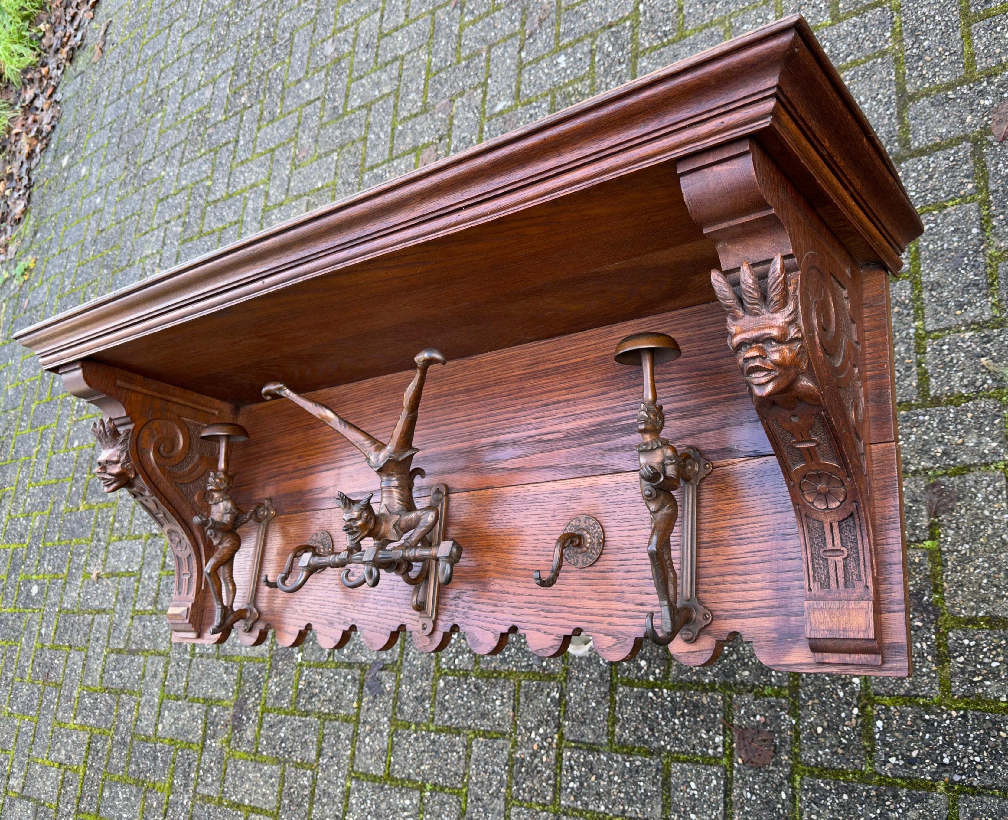 Bronzed Very Rare Antique Oak Wall Coat Rack w. Acrobatic Jester Figure Hooks, Great Fun For Sale