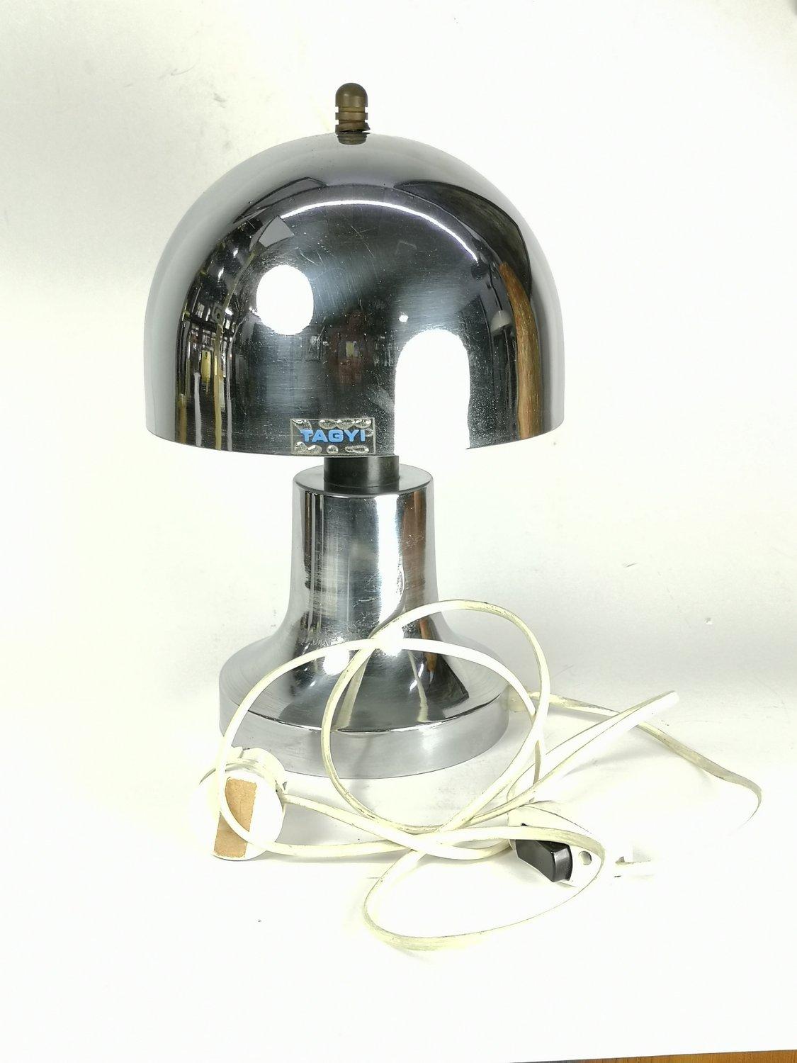 Extremely rare design lamp from the 1970's. These lamps were produced in very limited numbers, not in a factory setting. Zoltan Tagyi, award winning metal artist designed and probably also manufactured this striking light source. The attached