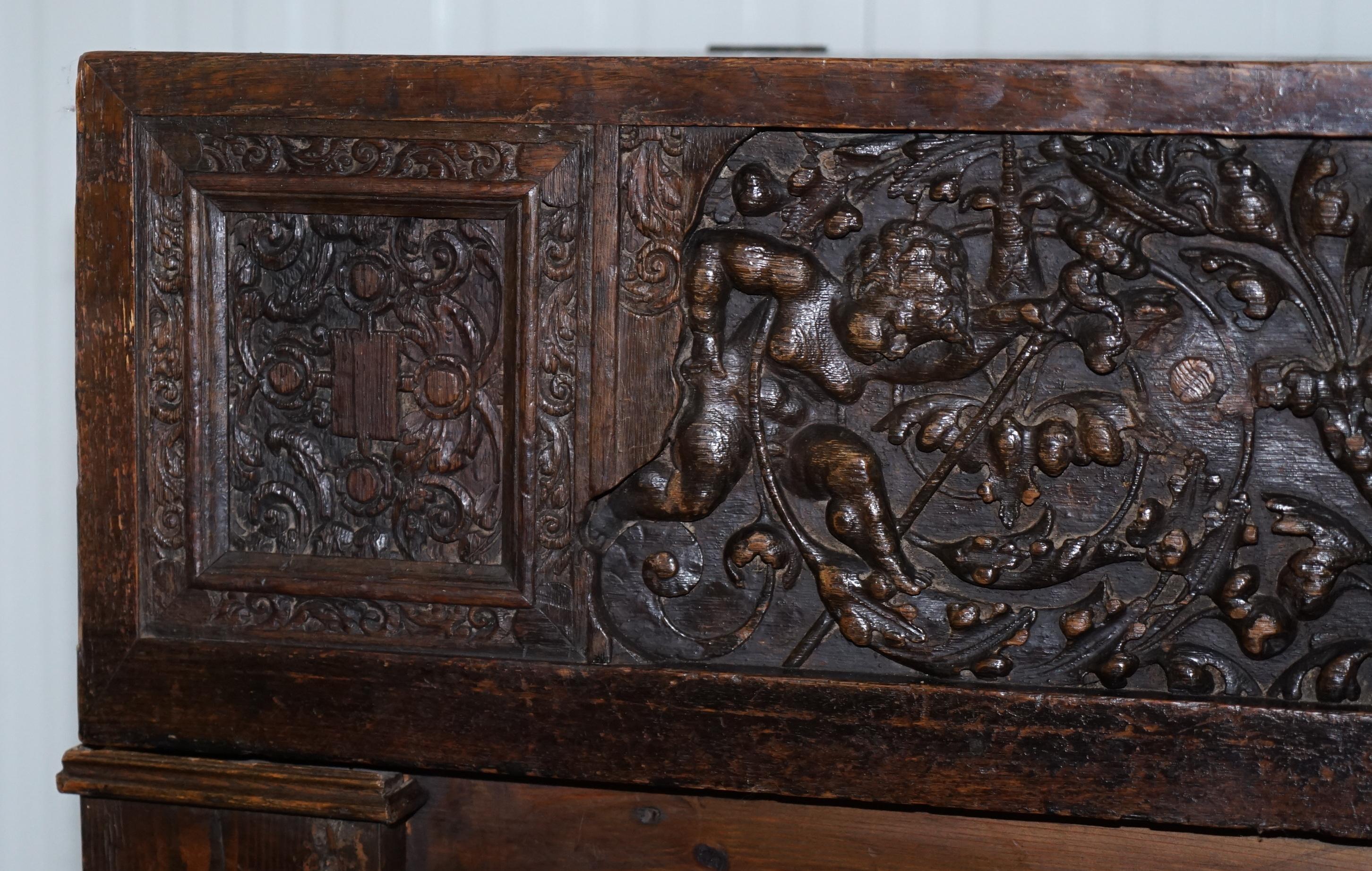 Oak Very Rare circa 1720 Trunk Chest Coffer on Stand Sideboard Carved Cherub Figures For Sale
