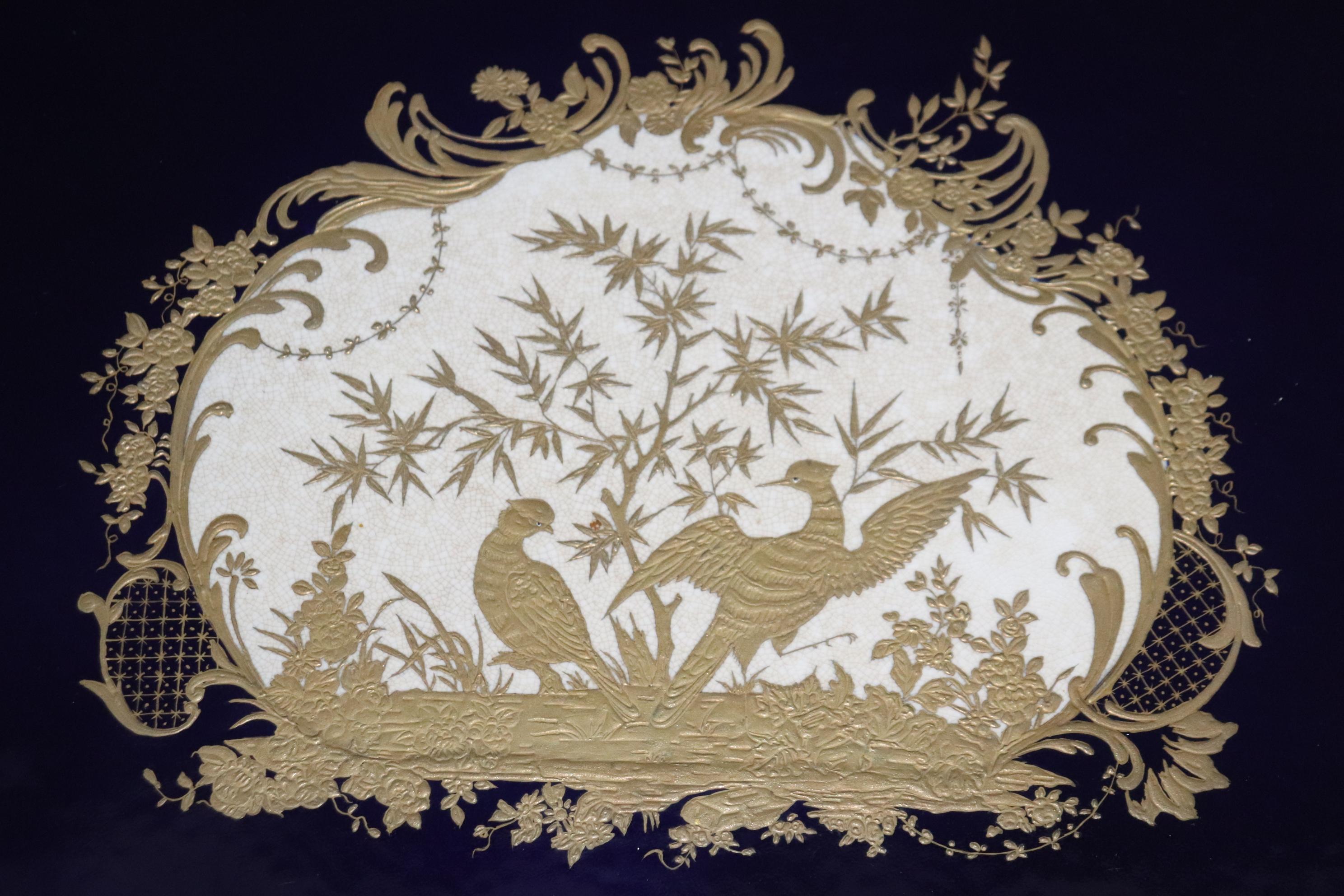 This is a MONUMENTAL table serving plateau made of the finest possible gold gilded dore' bronze with an incredible cobalt blue and crackled white background porcelain ground with gold gilded etched scenery of birds and foliage. The plateau also