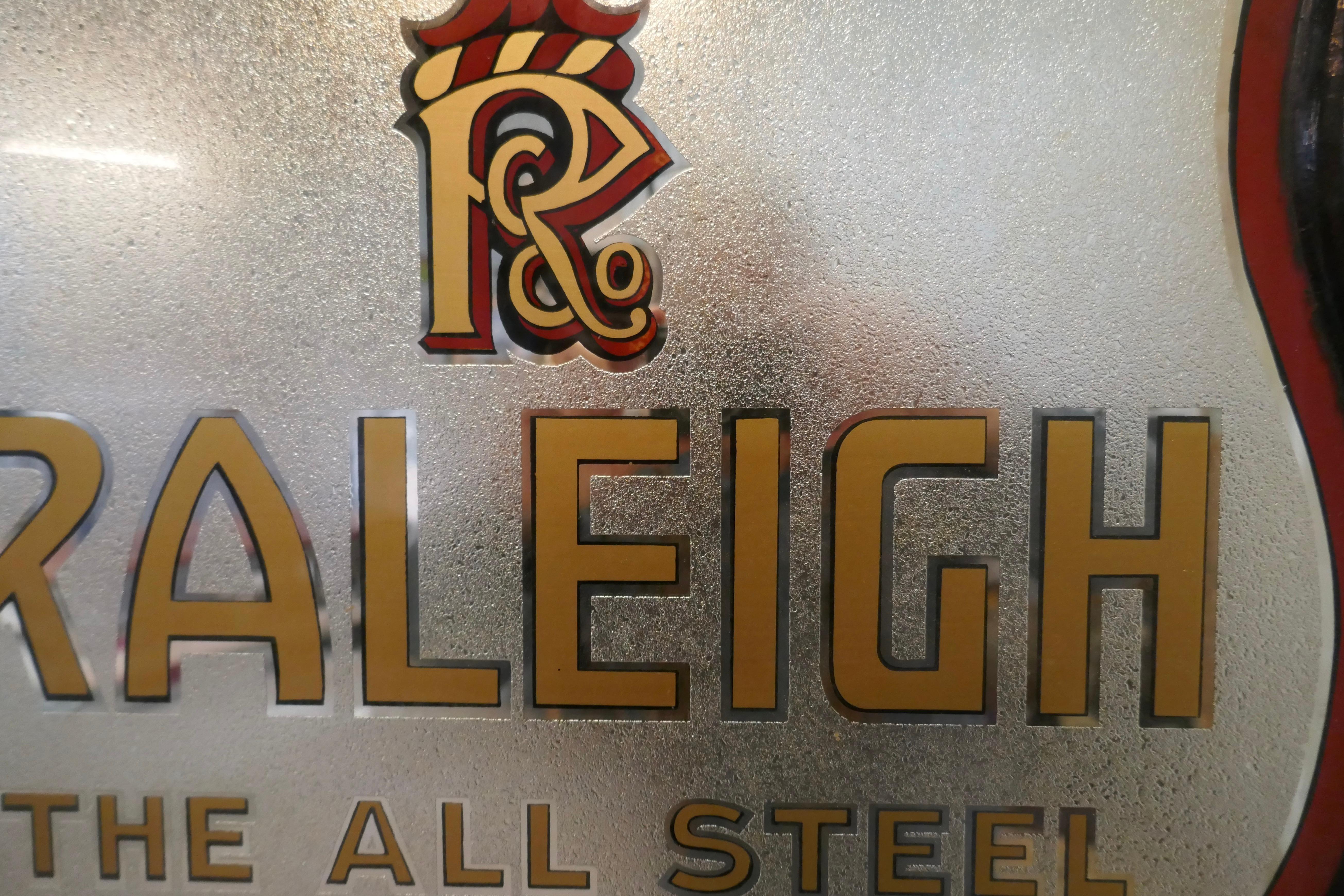 Very rare double sided glass Raleigh bike advertising shop sign

This is a beautiful Raleigh bike advertising shop sign, it is made in in a crackle finish mirror with enameled text in red and dark yellow

A great piece, dating back to the 1920s