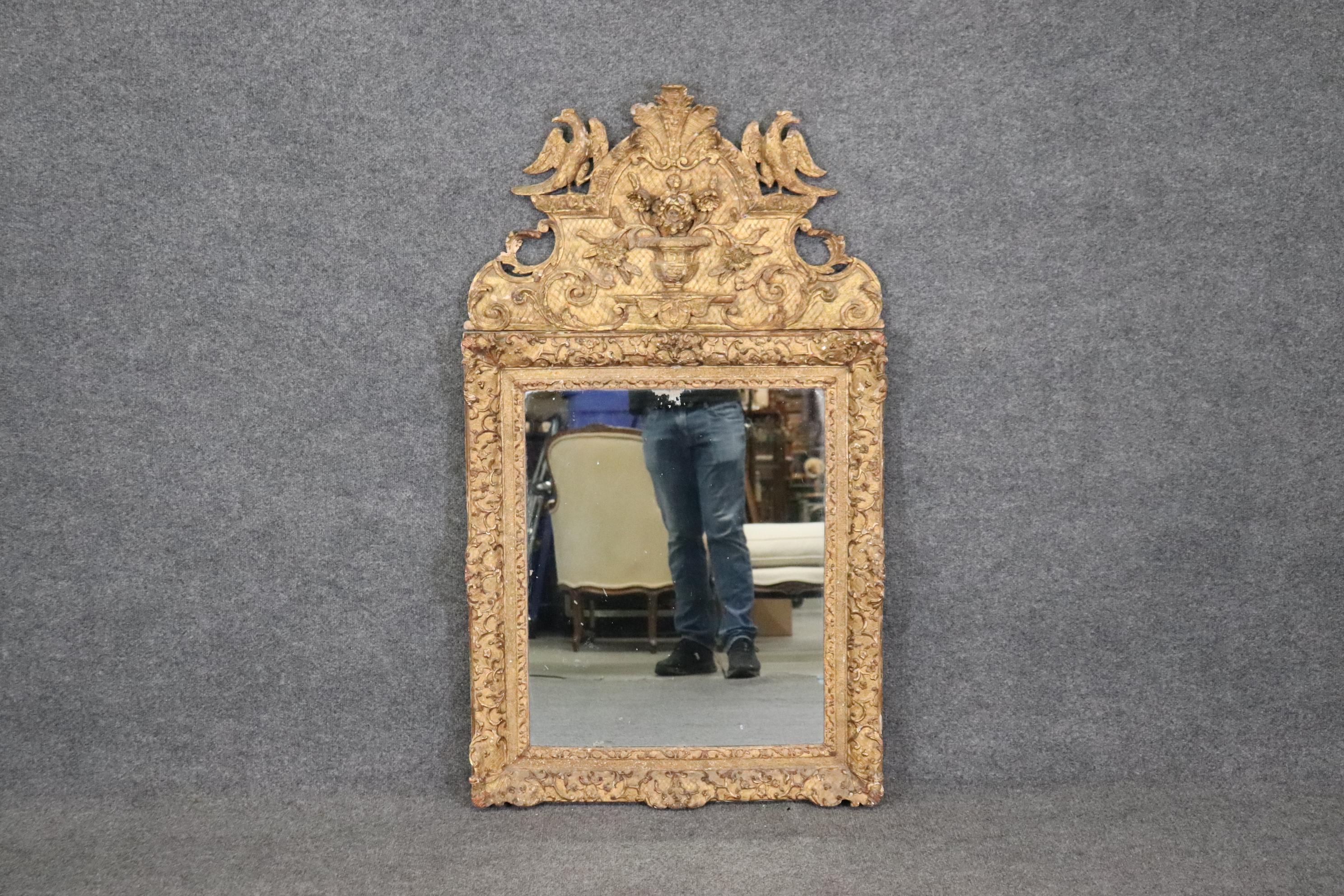 Early 18th Century Very Rare early 18th Century Period French Louis XIV Giltwood Mirror with Birds For Sale