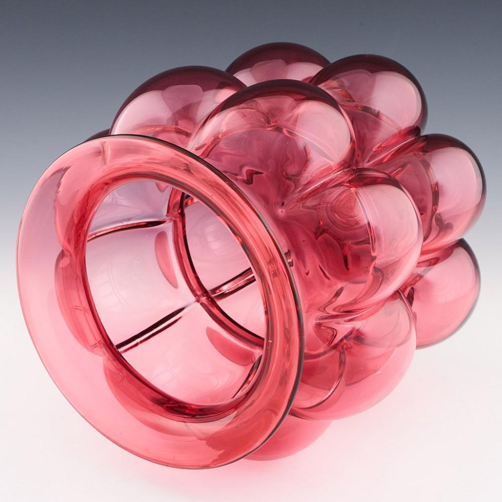 Very Rare Early Novy Bor Vase by Pavel Hlava, 1979

Additional information:
Date : 1979
Origin : Novy Bor
Bowl Features : Pink mould blown lobes
Marks : None
Type : Lead glass
Size : W 23 x H 23.7 cm
Condition : Very good, a small scuff on the rim