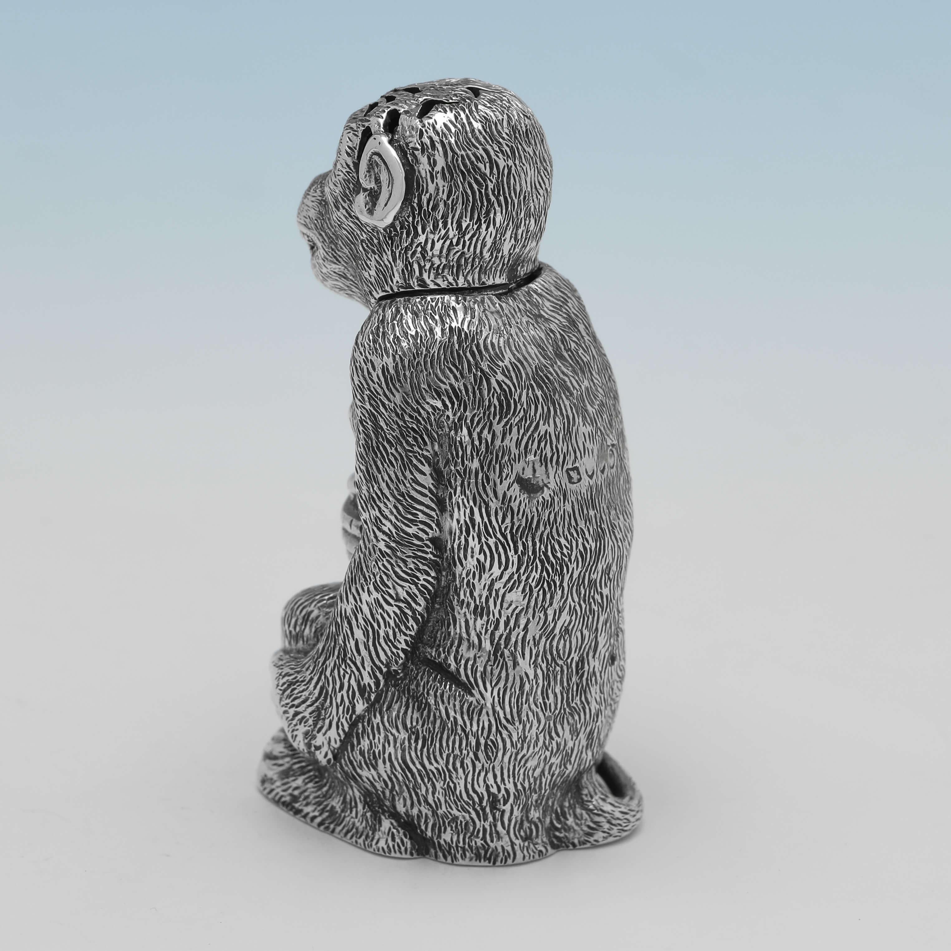 Hallmarked in London in 1881, this charming and very rare, Victorian, Antique Sterling Silver Pepper Pot, is modelled as a Monkey. 

The pepper pot measures 2.75