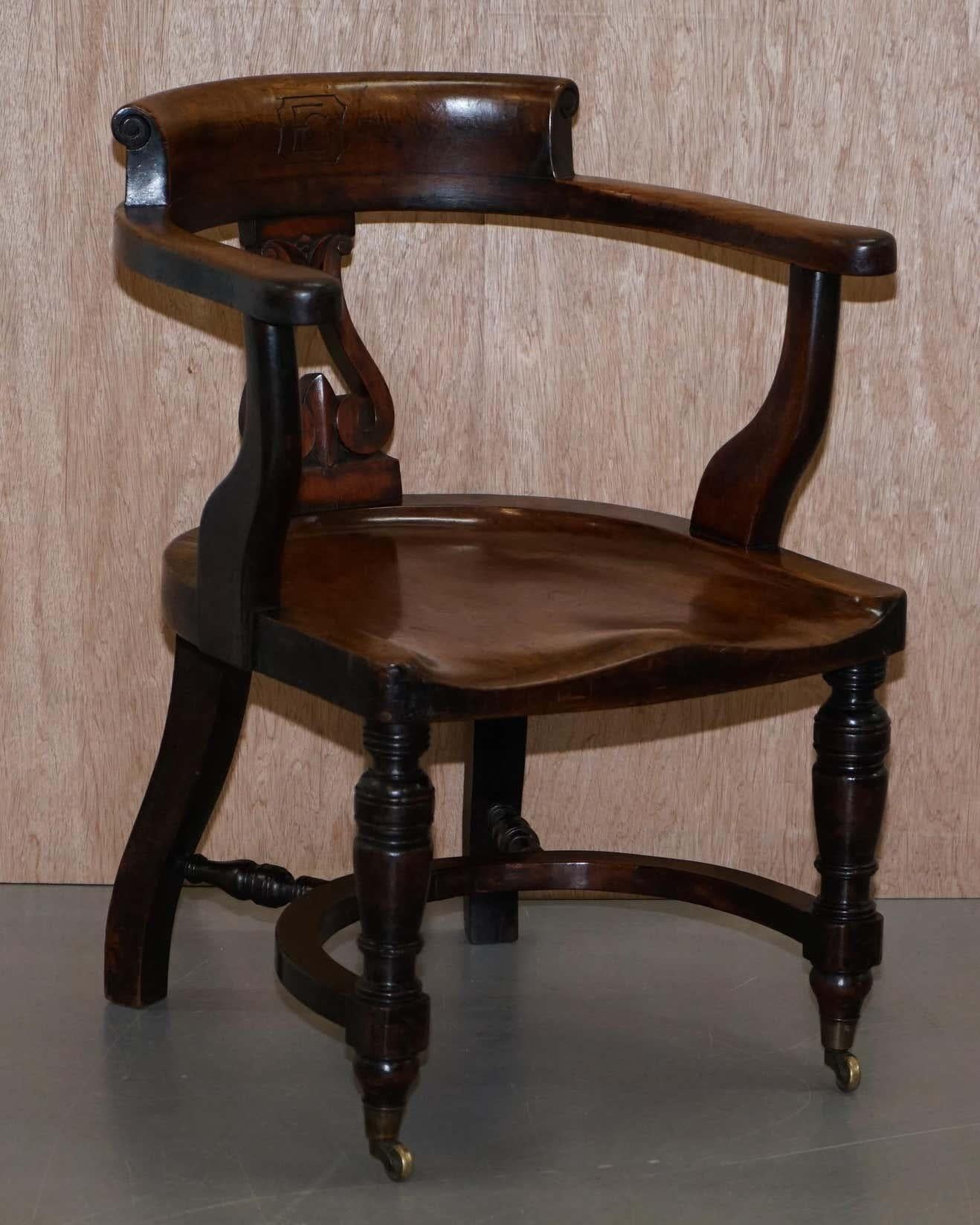 We are delighted to offer for sale this stunning and important original Victorian Walnut Eton College captain’s chair with carved with EC in the back rest.

A substantial find, I have never seen this chair for sale before, perfect as an office
