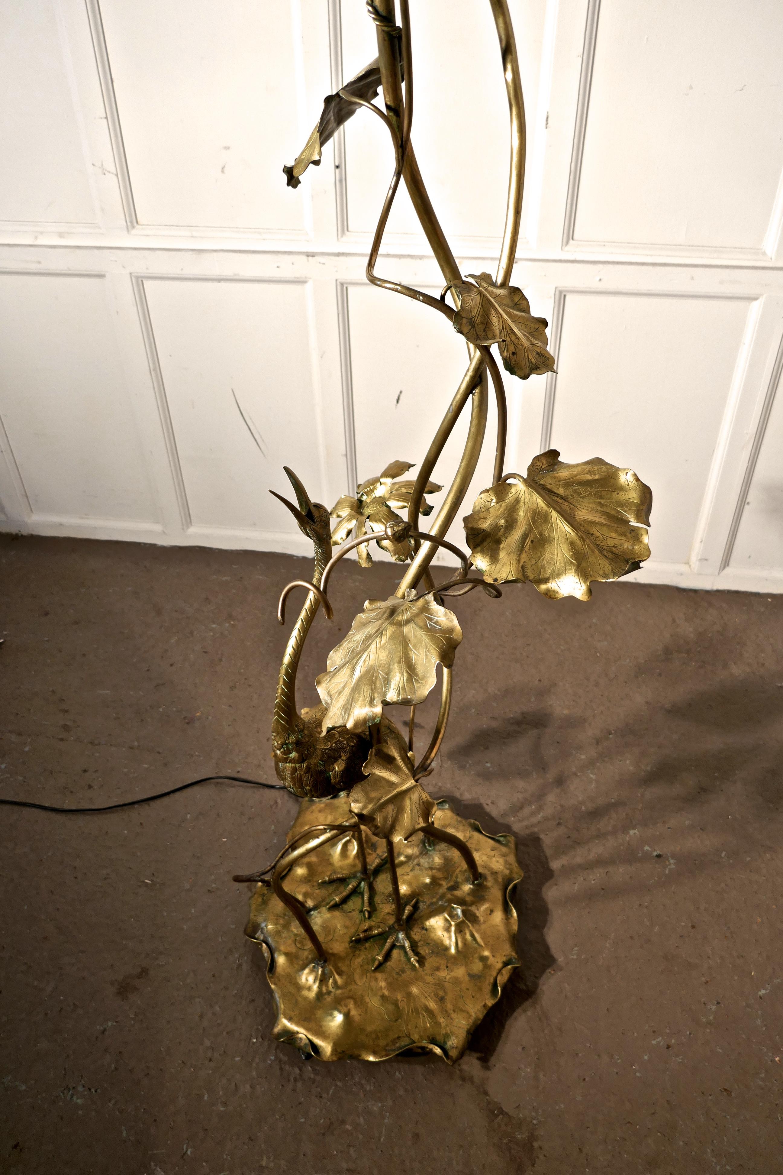 Very rare French Art Nouveau brass floor lamp with Heron and Water Lilies

A superb and very rare lamp, this one dates from the late 19th century, the tall brass heron stands on a large brass lily pad leaf, rising from which there are twining