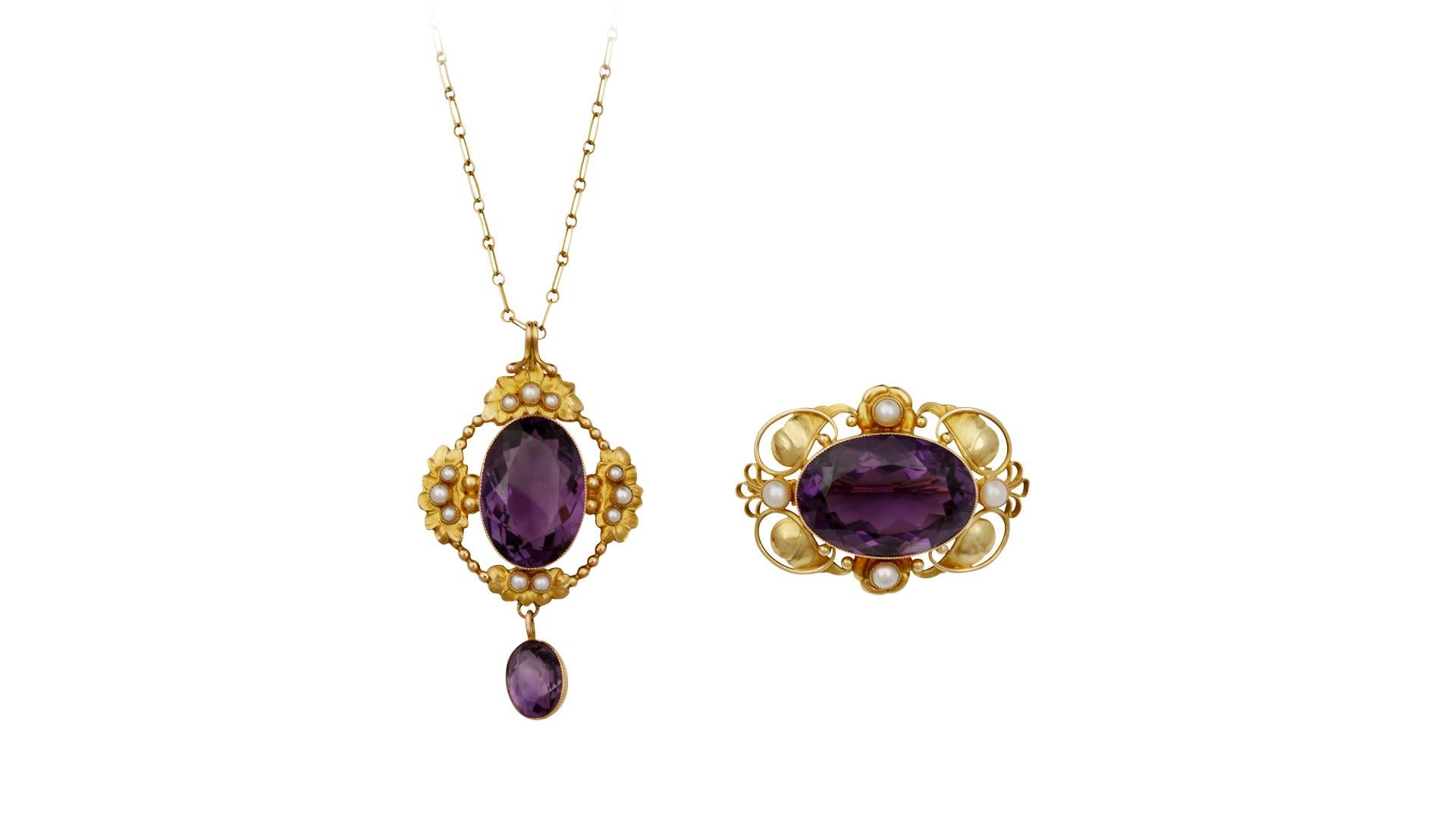 Rare Georg Jensen 18kt gold suite of a matching pendant and brooch, each with a large oval cut amethyst stone and pearls.

Both pieces were bought at the same time presumably between 1945-1952 and come in the original Georg Jensen and Wendel boxes