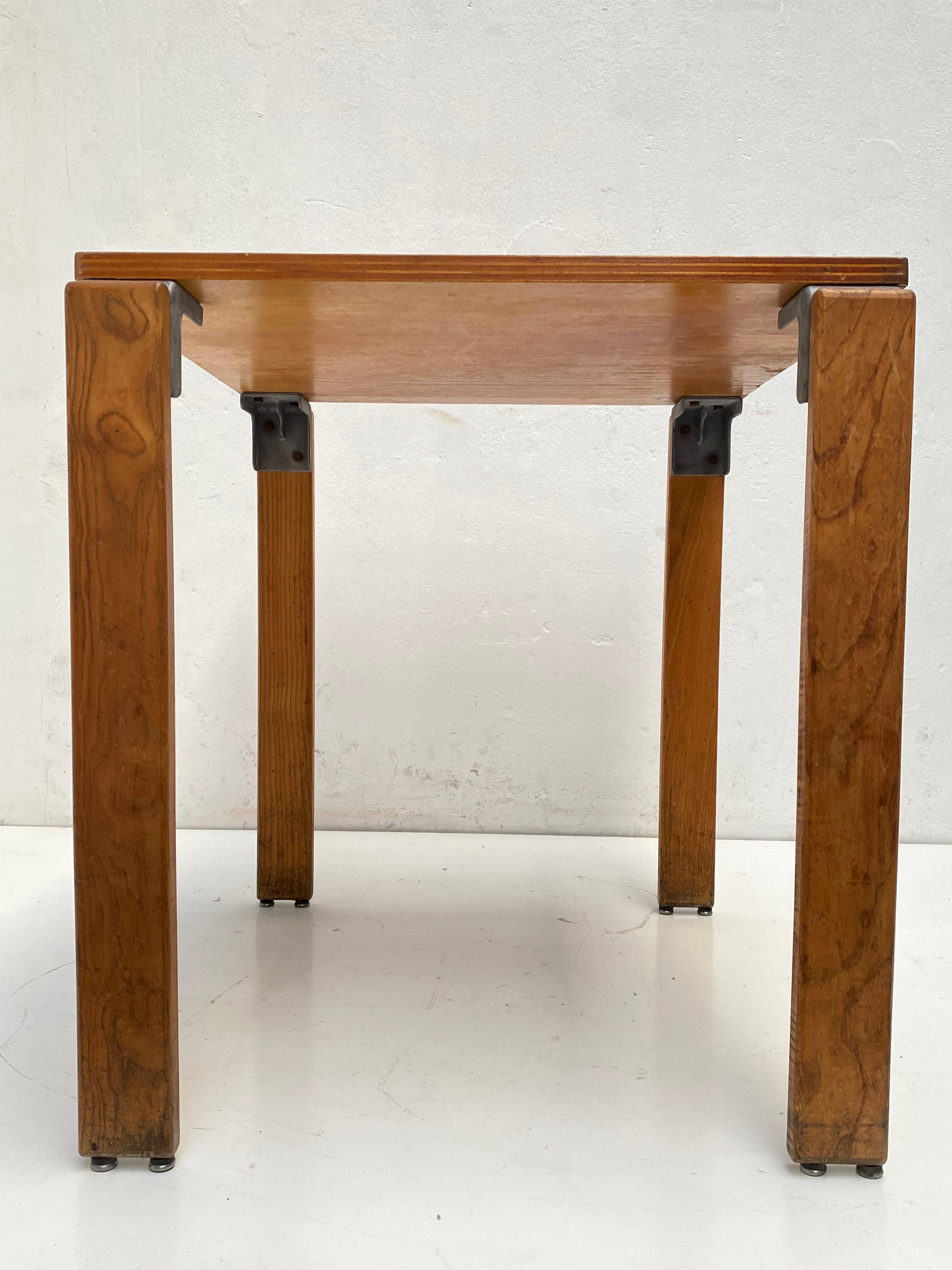 A rare dining table designed by architect Georges Candilis (1913-1995) .Candelis created this furniture for the 'Les Carrats' holiday resort that he designed in Port-Leucate, France with Finnish interior designer Anja Blomstedt (who also worked