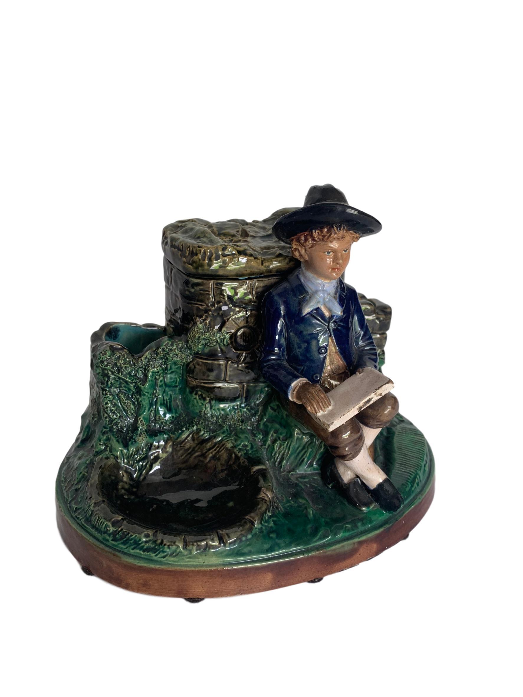 Very rare German Majolica Humidor, boy with books, circa 1880. By B. Block & Company, German. 
Slight wear to book.
For over 28 years we have been among the nation's preeminent specialists in fine antique majolica.