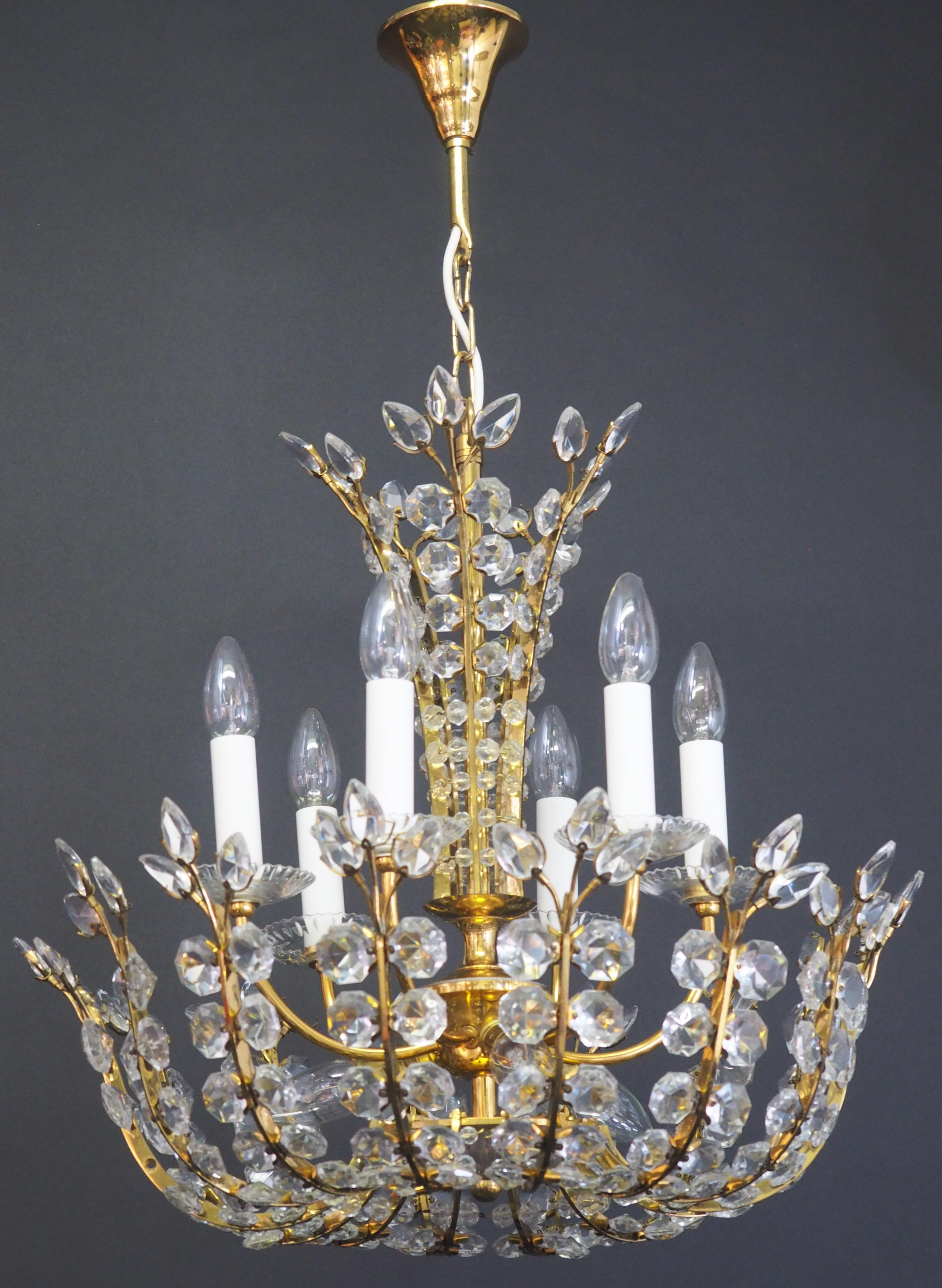 A very rare Austrian glass and gilt brass chandelier designed attributed to Oswaldt Haerdtl for Lobmeyr, circa 1950s, Vienna, Austria. 
Socket: 9 x e14 standard screw bulbs.





 