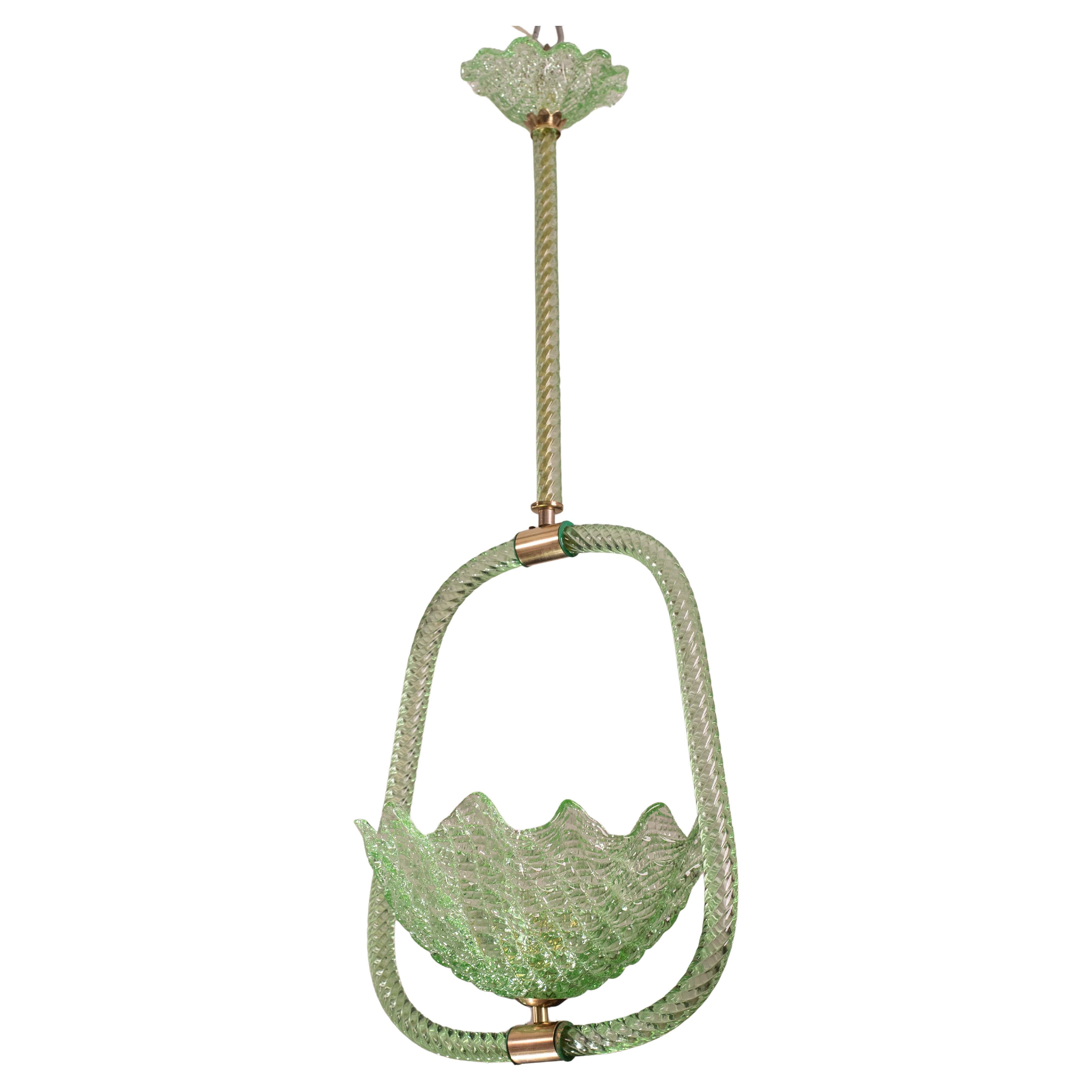 Stunning Murano chandelier extremely rare for its unique green color.
The chandelier is certainly attributed to the Barovier and Toso glassworks.
The chandelier mounts one e27 light points, possible to rewire for Usa standards.
It measures 90