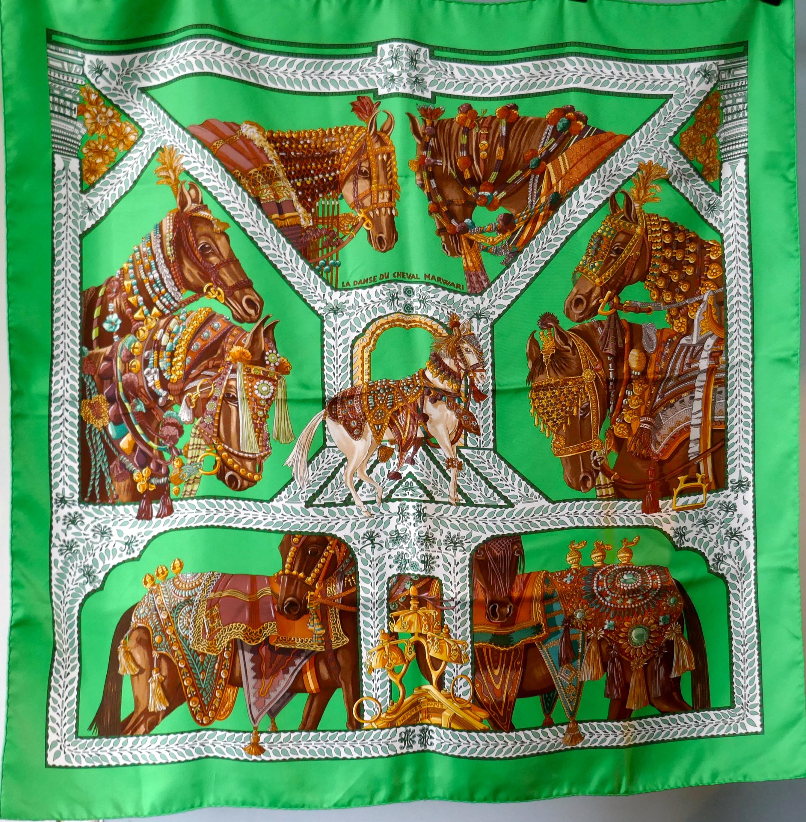 Very Rare Hermes Black Silk Scarf “Danse du Cheval Marwari” by Annie Faivre, 2008

Beautiful unworn Hermes “Danse du Cheval Marwari” by Annie Faivre. 

This is an exquisite and stunning Green Brown and Orange Pallet, one for the collector, portrait
