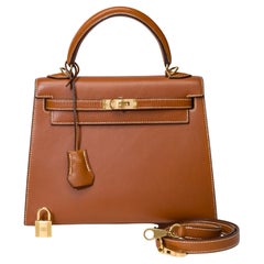 Very Rare Hermès Kelly 25 sellier handbag strap in Gold Barenia leather, GHW