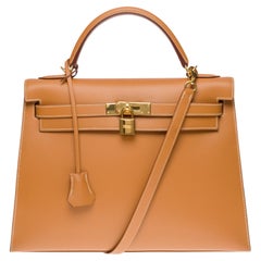 Very Rare Hermès Kelly 32 sellier handbag strap in Gold natural calfskin , GHW