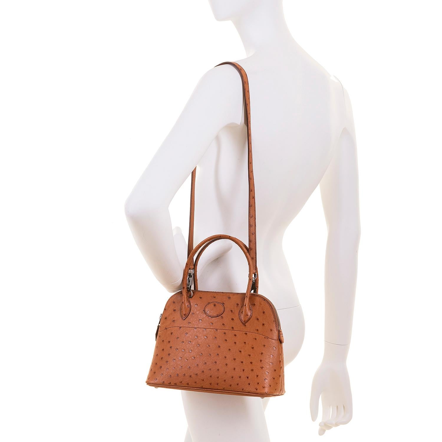 The Rare 'Mini' Hermes Bolide Bag - just 10in. wide, is very sought-after. This particular bag is made in exotic 'Miel' - Honey coloured Ostrich Skin. This dynamic leather, known for it's 