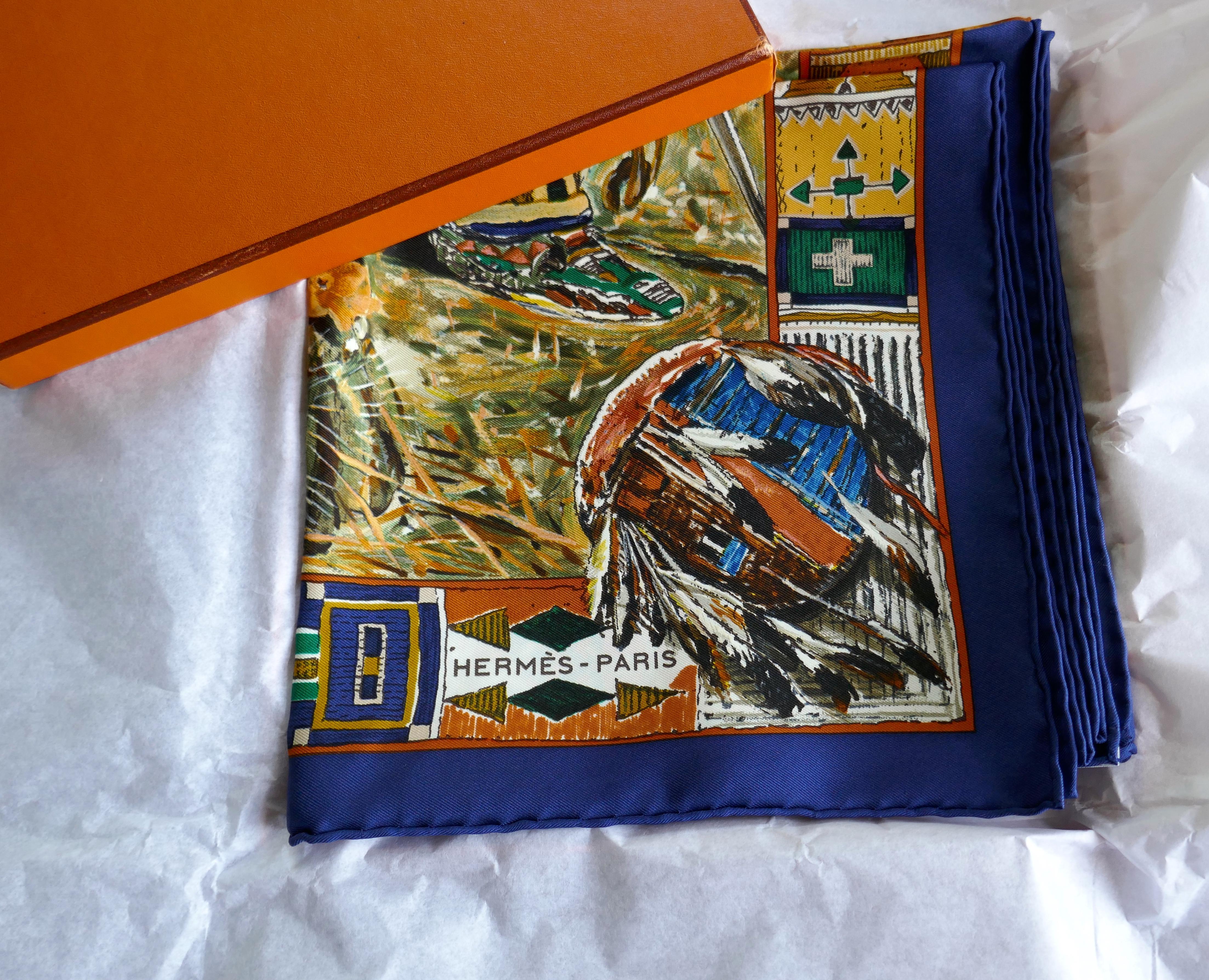 Very Rare Hermes Silk Scarf ”Plumes de l’Ouest” by Kermit Oliver, 1993

Beautiful unworn Hermes “Plumes de l’Ouest” by American designer Kermit Oliver. 
This is an exquisite and rare design silk scarf from 1993, Navy Border, one for the