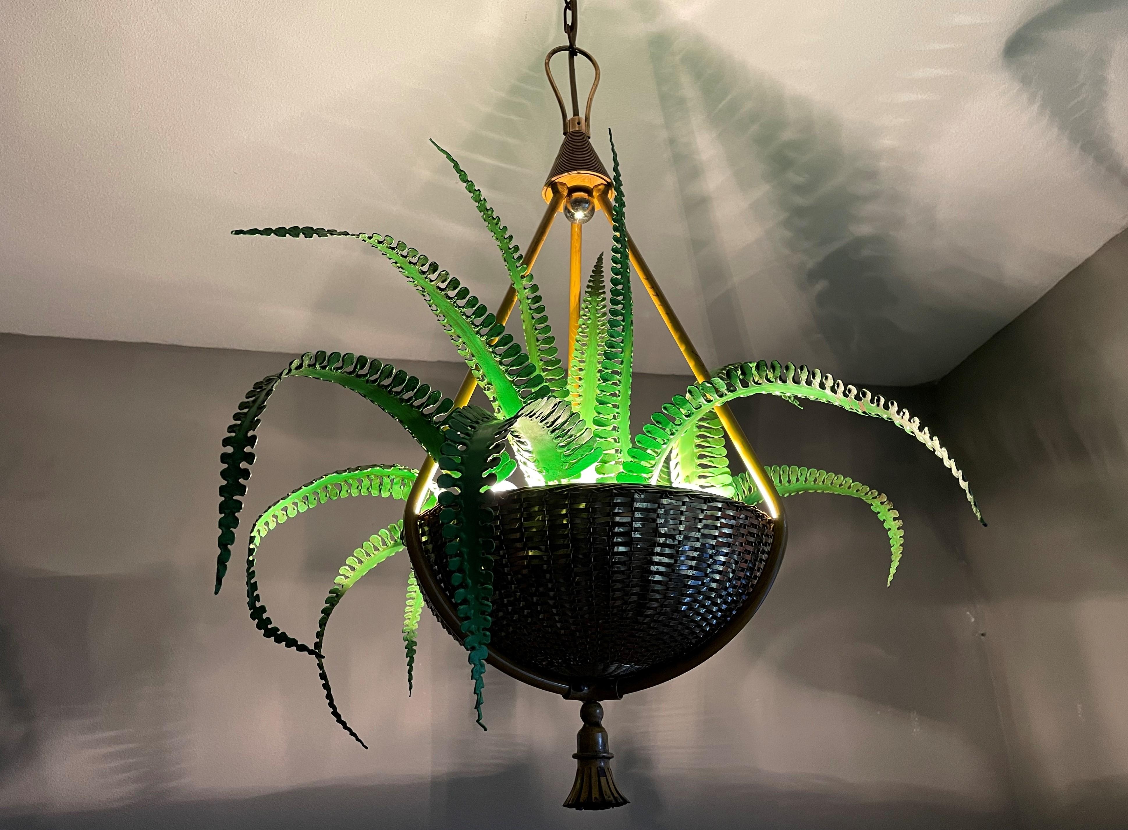 Truly artistic & extremely rare, midcentury made, fern plant in wicker-like basket chandelier.

If you are looking for a striking and extraordinary light fixture to grace your living space then this French work of lighting art could be the one for