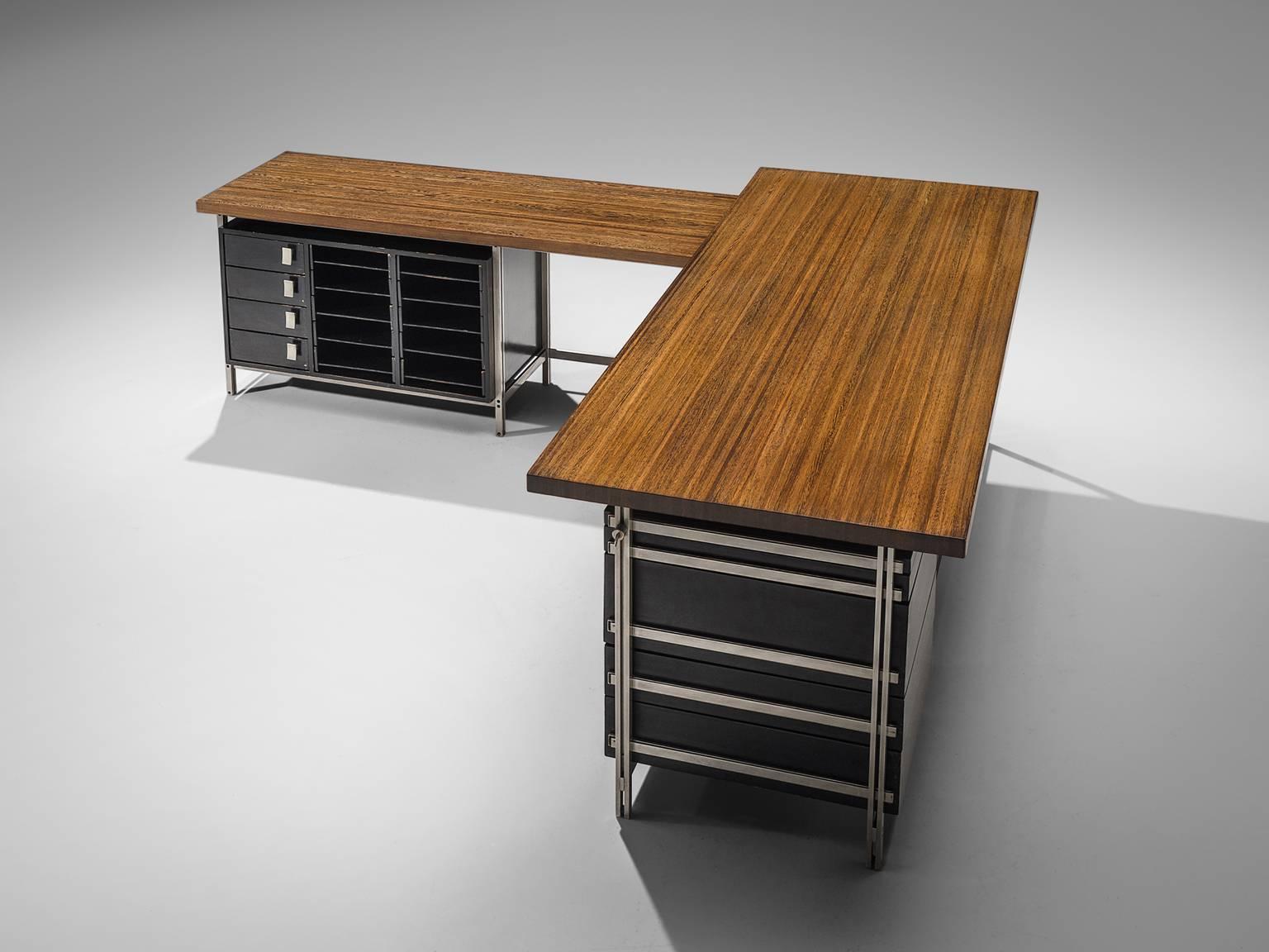 Jules Wabbes, writing desk with drawer pieces, wenge wood tabletop; chrome frame, drawers black, Belgium, 1960s

This corner desk is designed by Jules Wabbes, The table is executed with a solid wenge wooden top, made out of tangentially-sawn wenge