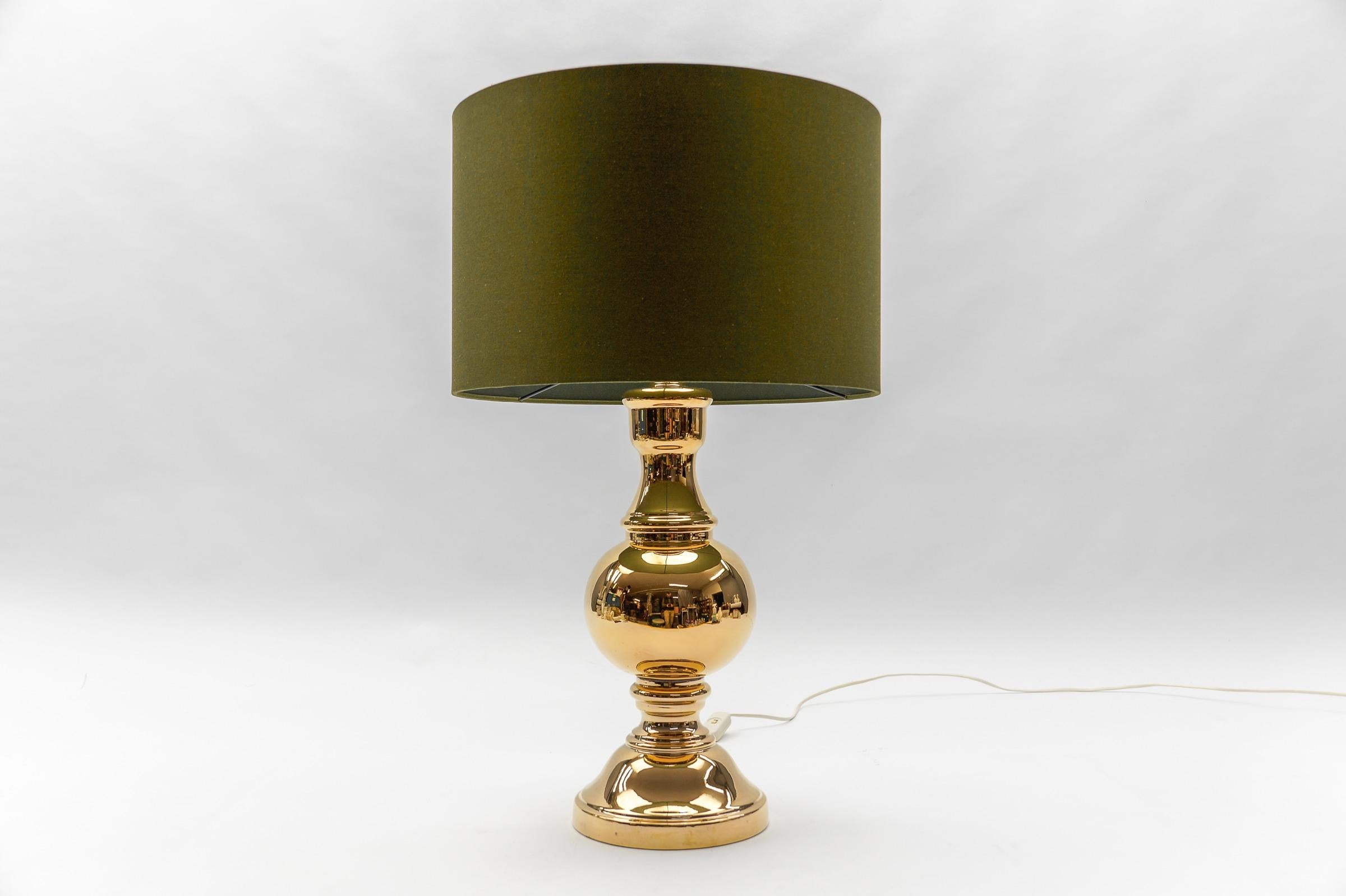 These ceramic table lamp was designed in the 1960s. 

The pictures with the lampshades are for illustration purposes and as an example of how the lamp bases look with a lampshade. These are not part of the offer.