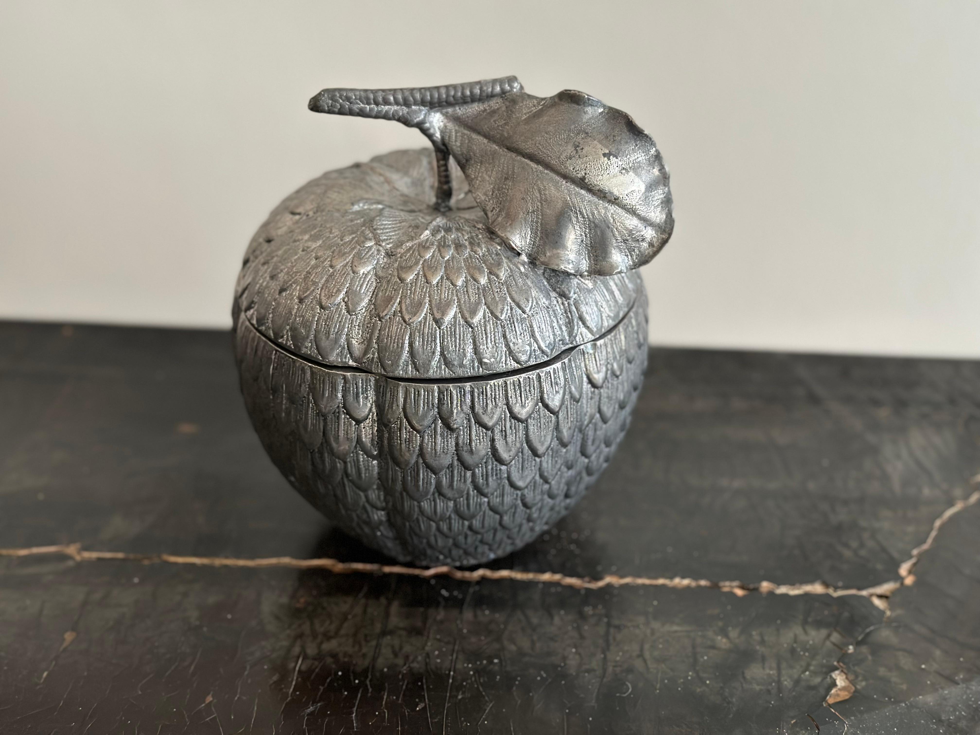 Very Rare Mauro Manetti Apple Ice Bucket from Florence, Italy, circa 1970

This exquisite ice bucket, shaped like a apple, is a true treasure from the 1960s. Crafted with meticulous care by the talented Italian artist Mauro Manetti in his workshop