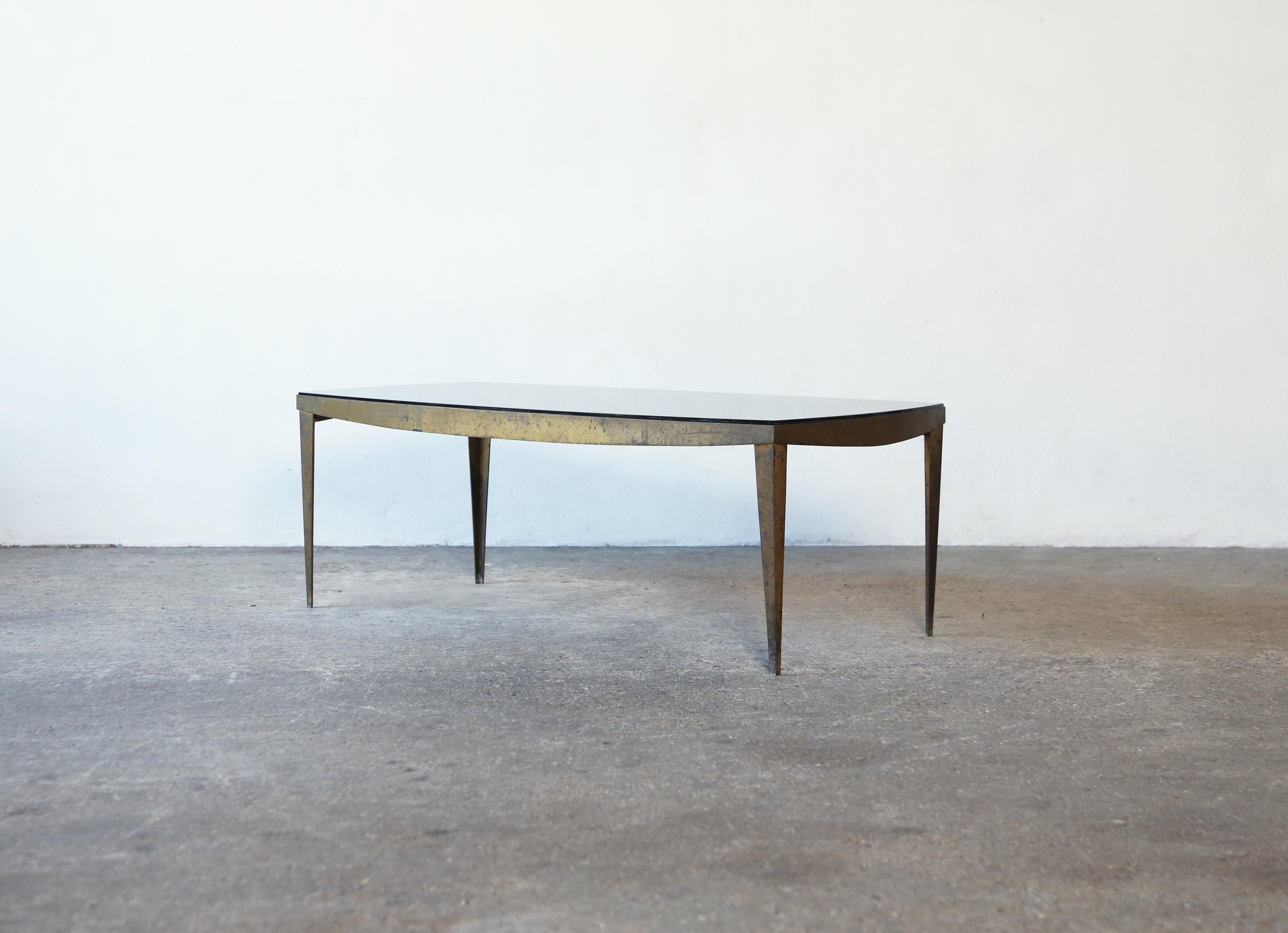 A very rare Max Ingrand Model 2352 Coffee Table, produced by Fontana Arte, Italy, 1960s  Brass, gold leaf and mirrored, tinted glass.   In original condition with signs of use and age.   Fast shipping worldwide.

Bibliography: Quaderni Fontana Arte,