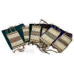 Very rare Melanesian armbands made of woven palm fibers and tiny shells