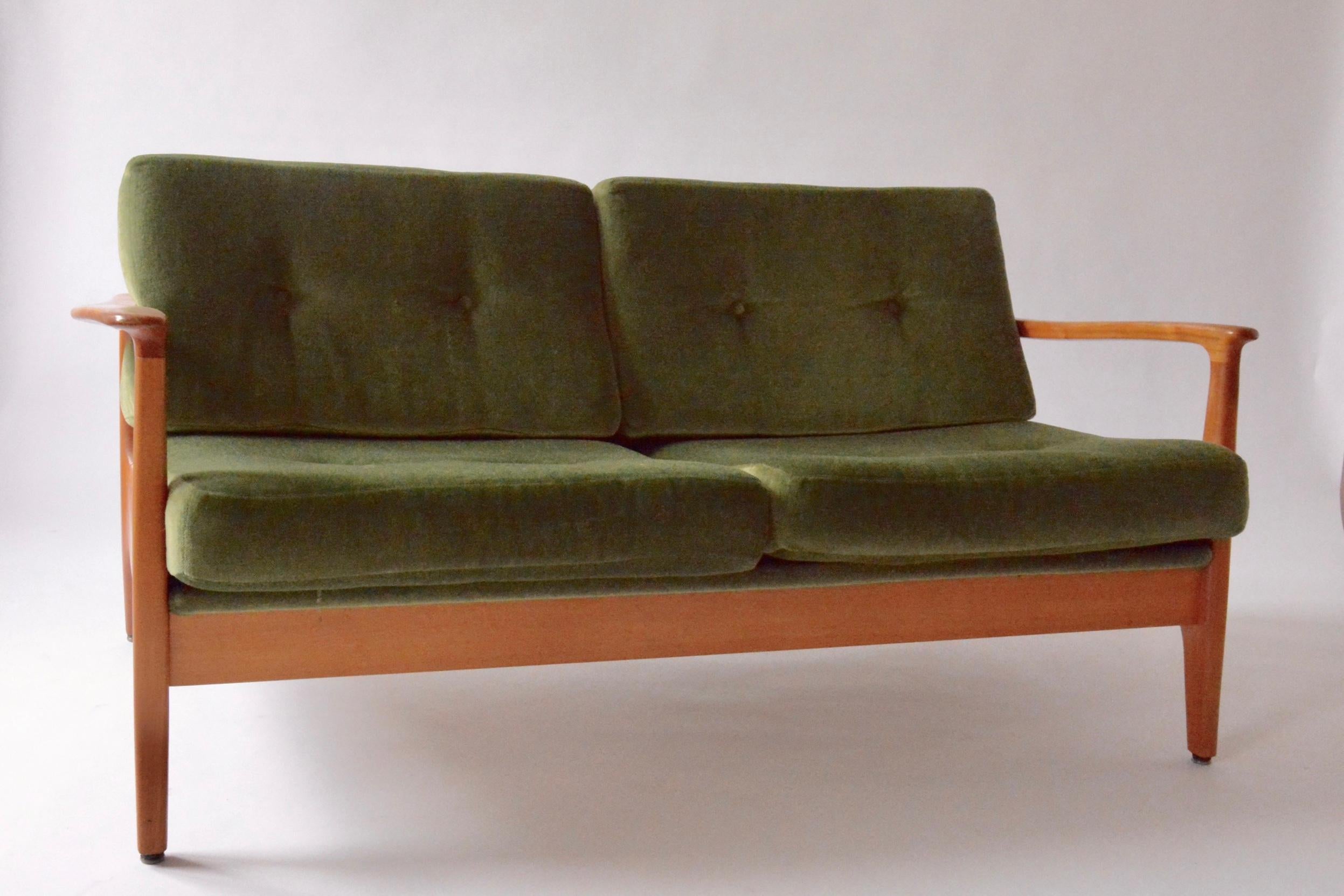 This very rare Eugen Schmidt 2-seater has a beautiful and organic shaped frame of massive cherry. The design was made for the German government buildings in the 1960s. As seen with mohair velvet cushions and very carefully handcrafted wooden