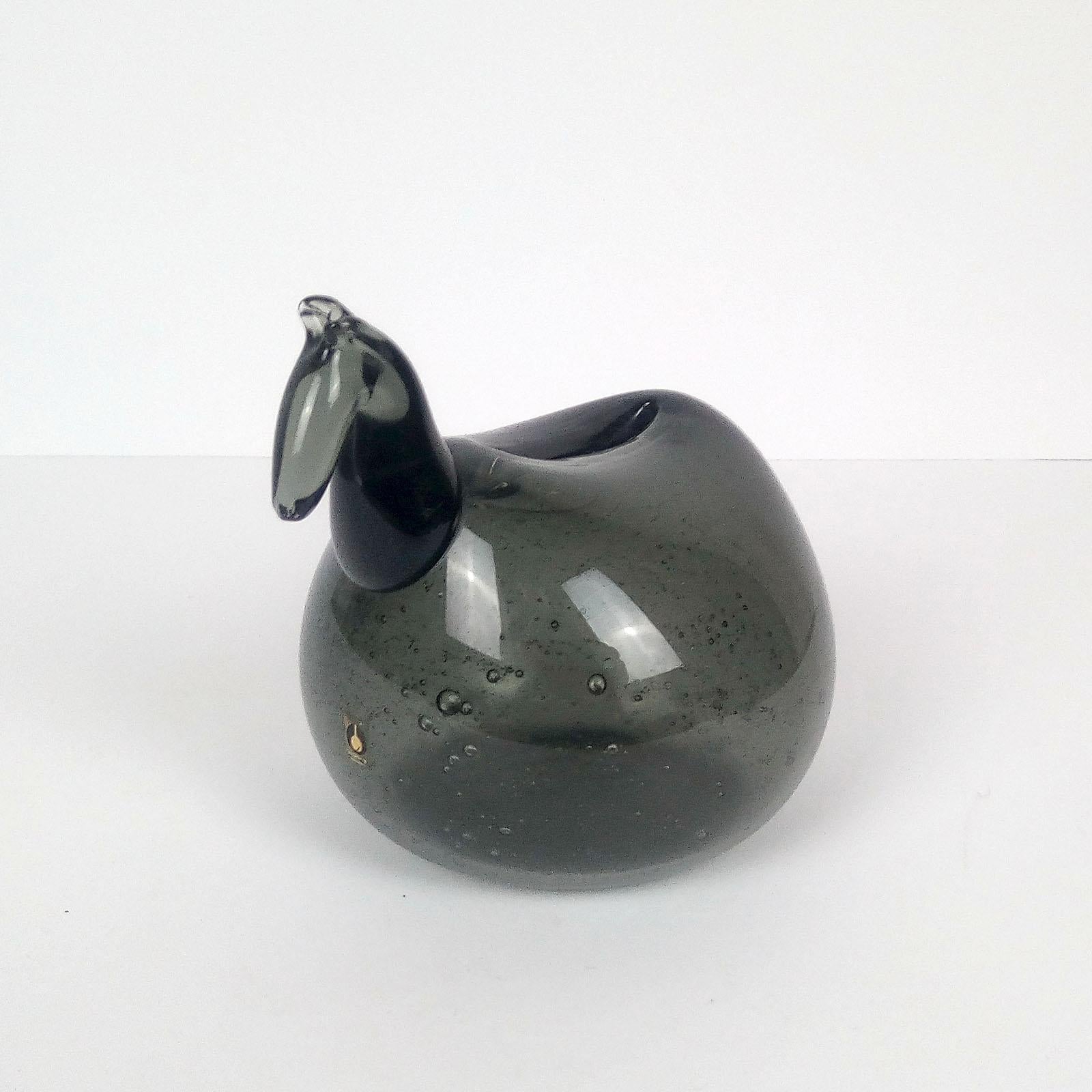 Very rare midcentury glass piggy bank by Goran Warff for Pukeberg, Sweden, 1962.
Glass horse sculpture in the form of a piggy bank, signed and dated 1962. Original manufacturer label to the front. In excellent condition.
Dimensions: Height 11 cm,