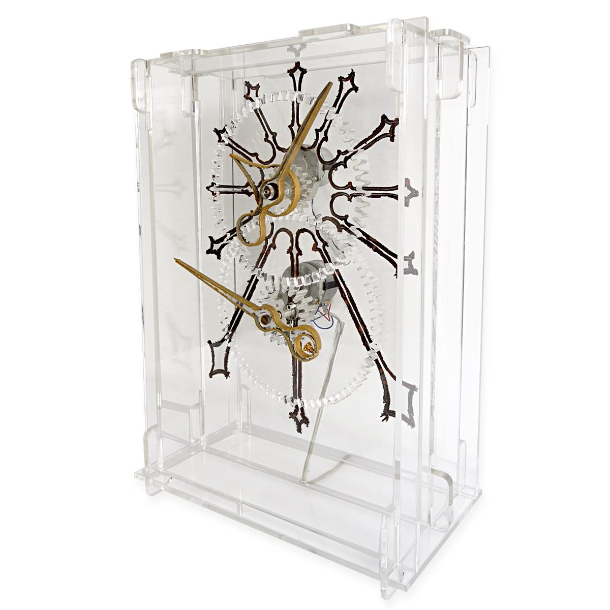 Huge clock designed by French designer Boris Tabacoff, who also created the famous Sphère Chair.
The clock is made of plexiglass that was cut by laser. It is signed: Tabacoff 1976, J. Esquine.
Including plexiglass wall mountable carrier.
The clock