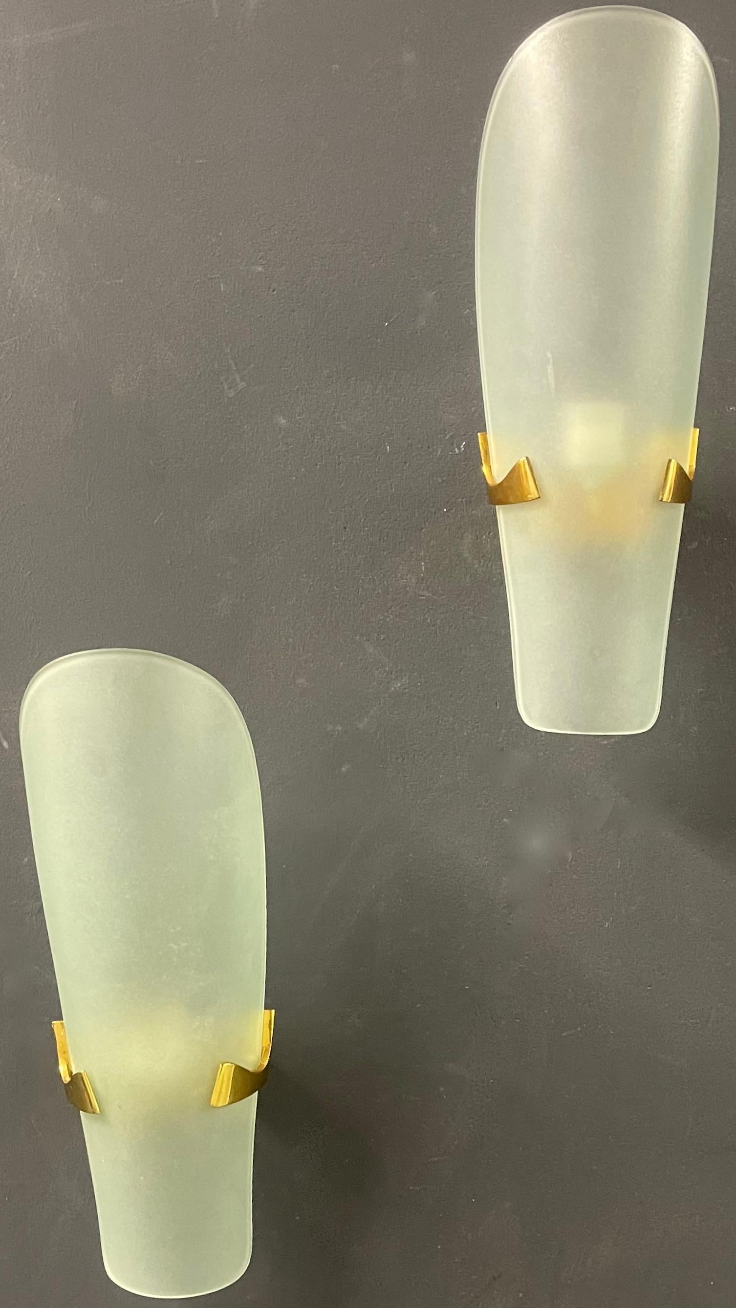 rare and elegant pair of max ingrand for fontana arte no. 1636  wall sconces. brass fixture with acid-atched glass. iconic design....
worldwide free shipping.