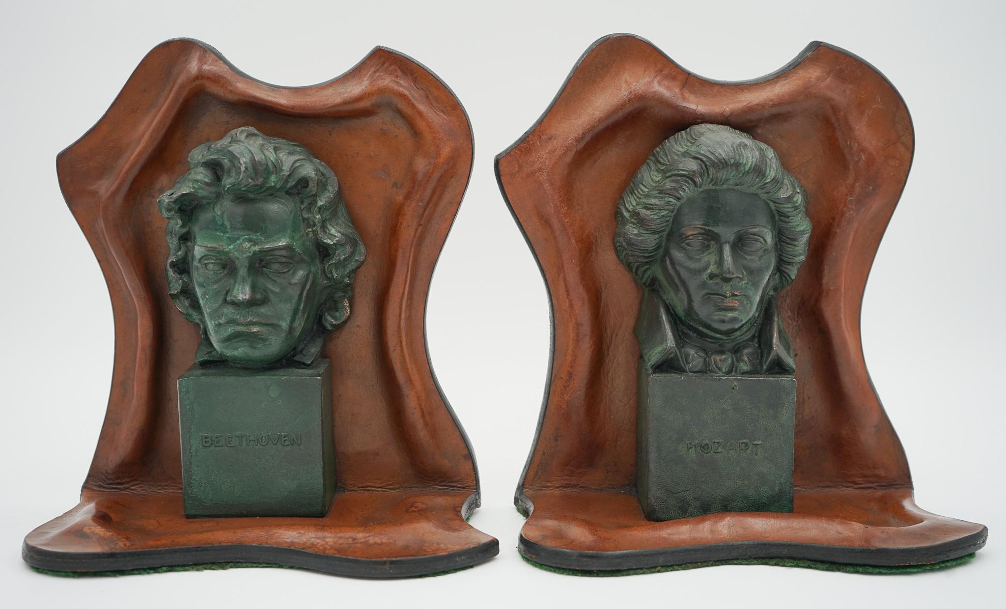 
We are delighted to offer for sale These exquisite leather bookends, celebrating the legendary composers Wolfgang Amadeus Mozart and Ludwig van Beethoven, are a magnificent testament to artistry and craftsmanship. They possess a very rare charm due