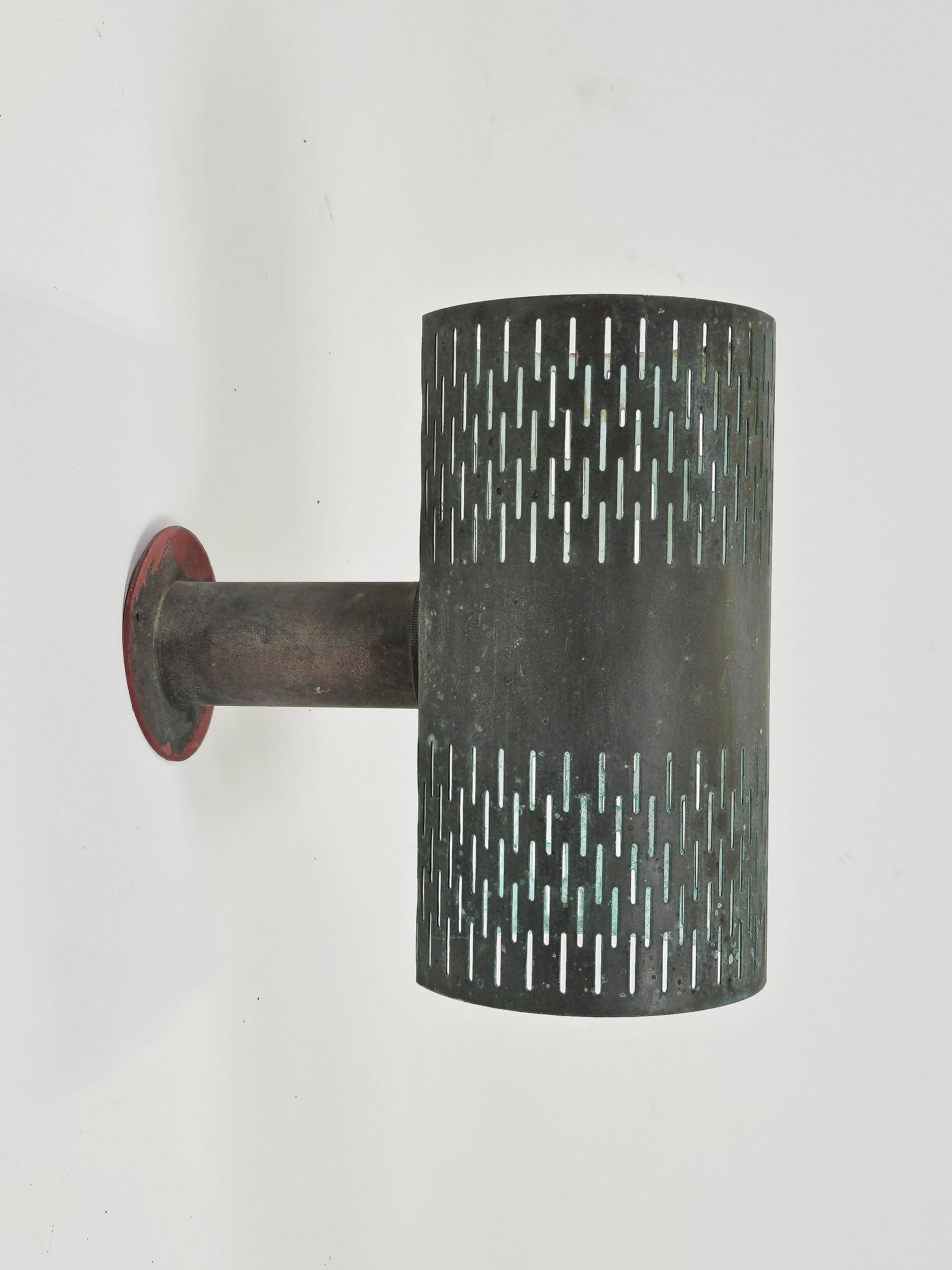 Rare outdoor wall lamps by Hans Bergström for Ateljé Lyktan, Sweden, 1950s.

These high-quality lamps are made of solid copper with a perforated pattern that looks amazing when lit.

