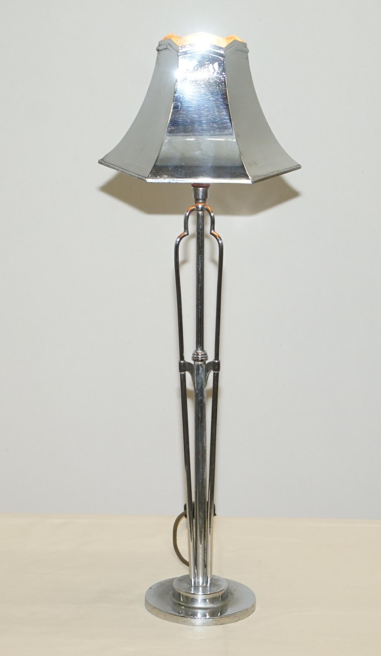 We are delighted to offer for sale this sublime pair of side table lamps, chromed metal, made by Tucker & Edgar Ltd London, designed by Miss Elsie Roberts in the studio of Oswald Milne for Claridges Hotel, ca.1932

A very rare a well made pair, they