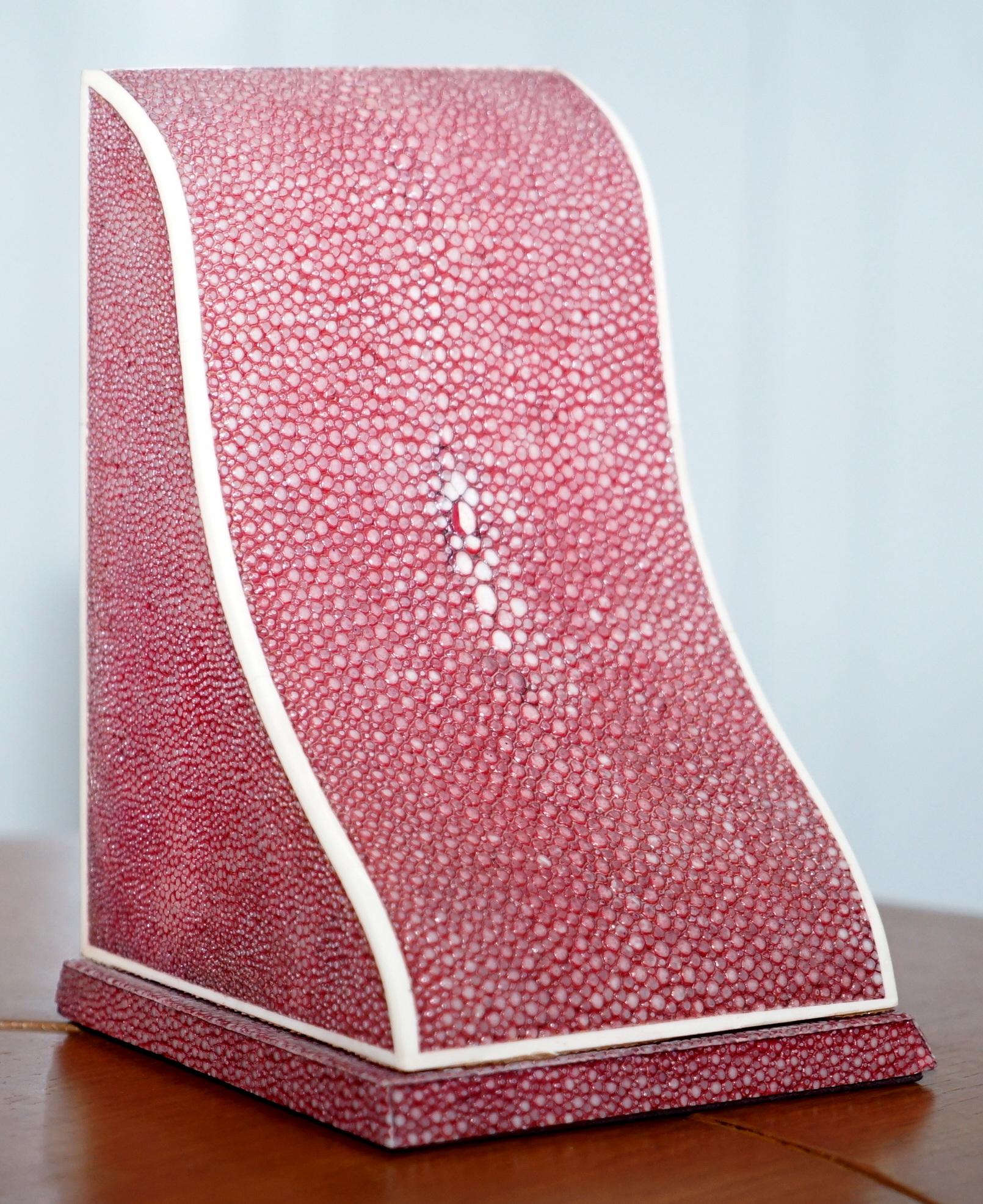 We are delighted to offer for sale this exceptionally rare pair of Art Deco 1920 Asprey London Shagreen (Shark skin) bookends

These bookends are a trifactor of collectability, Shagreen is highly collectable as are sculptural items from the Art