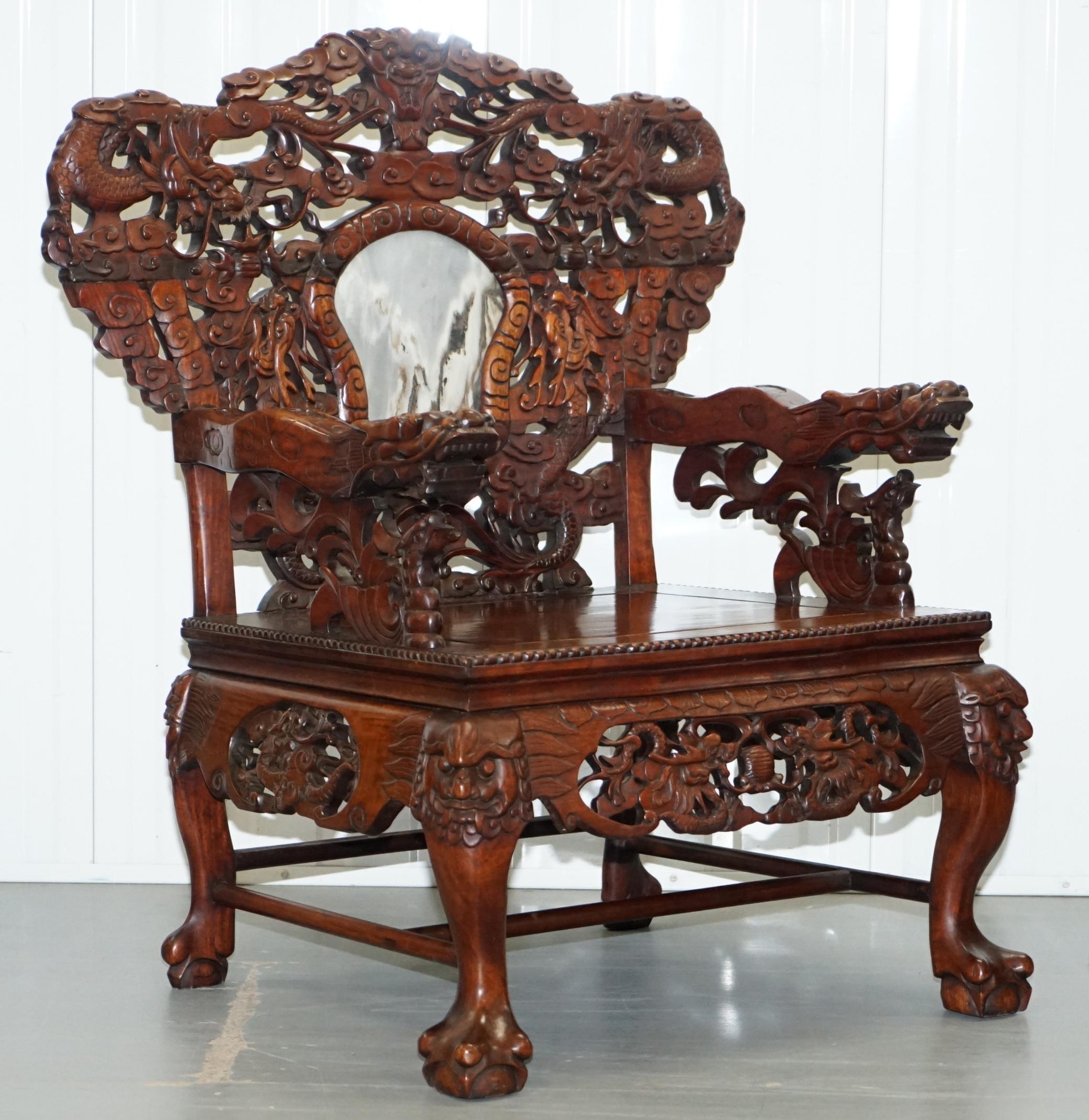 We are delighted to offer for sale this very rare pair of stunning hand carved solid Elm lacquered throne armchairs with marble backrests and ornate dragon detailing 

A really rare and expertly hand carved pair, the detail is never ending and of