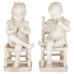 Very Rare Pair of Marble Sculptures of Seated Children by Cesare Lapini
